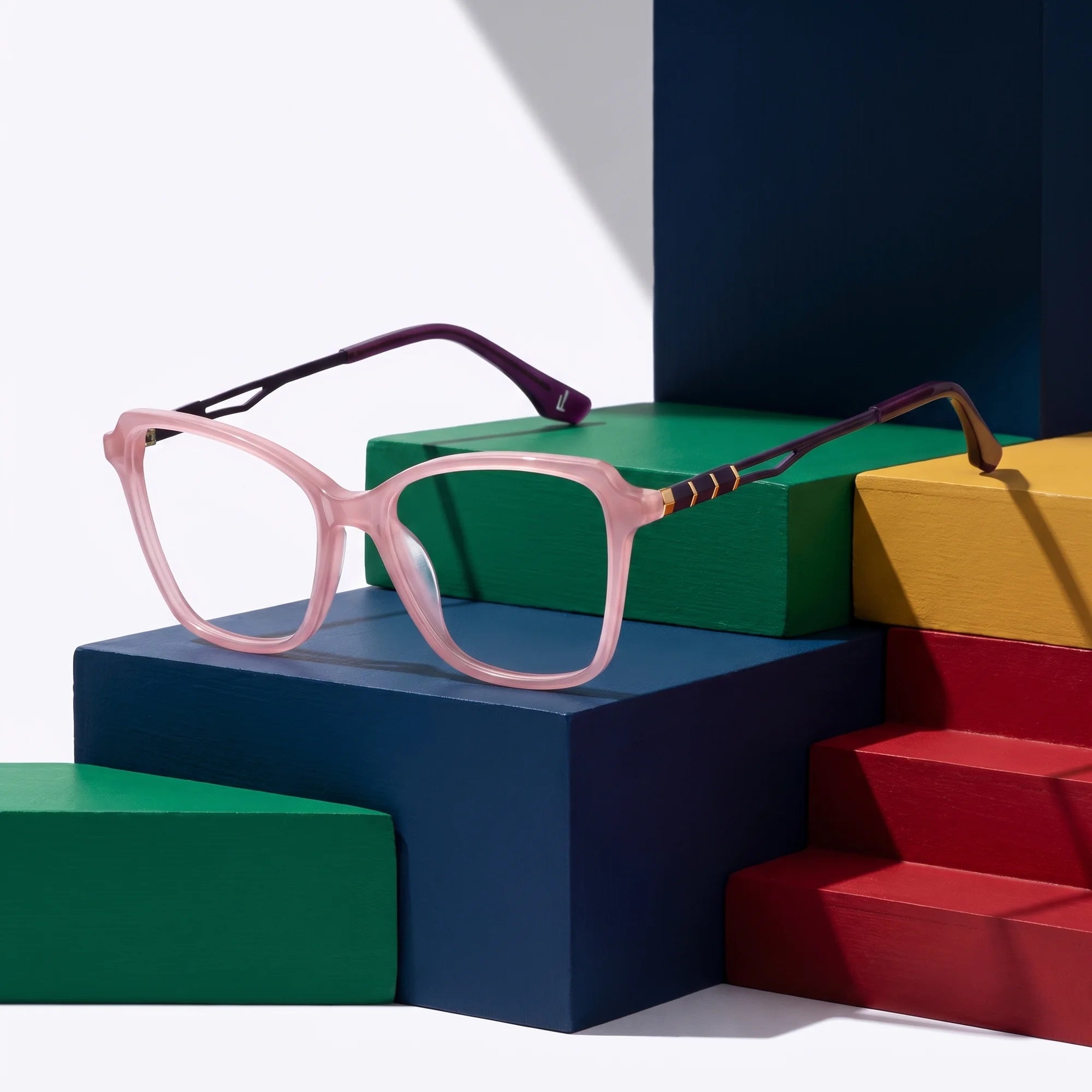 Fiore 1006 eyeglasses in pink – on bold primary color-block steps