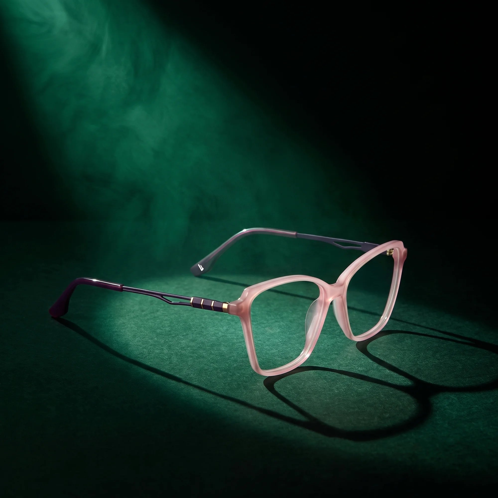 Fiore 1006 eyeglasses in pink – under a theatrical beam of light