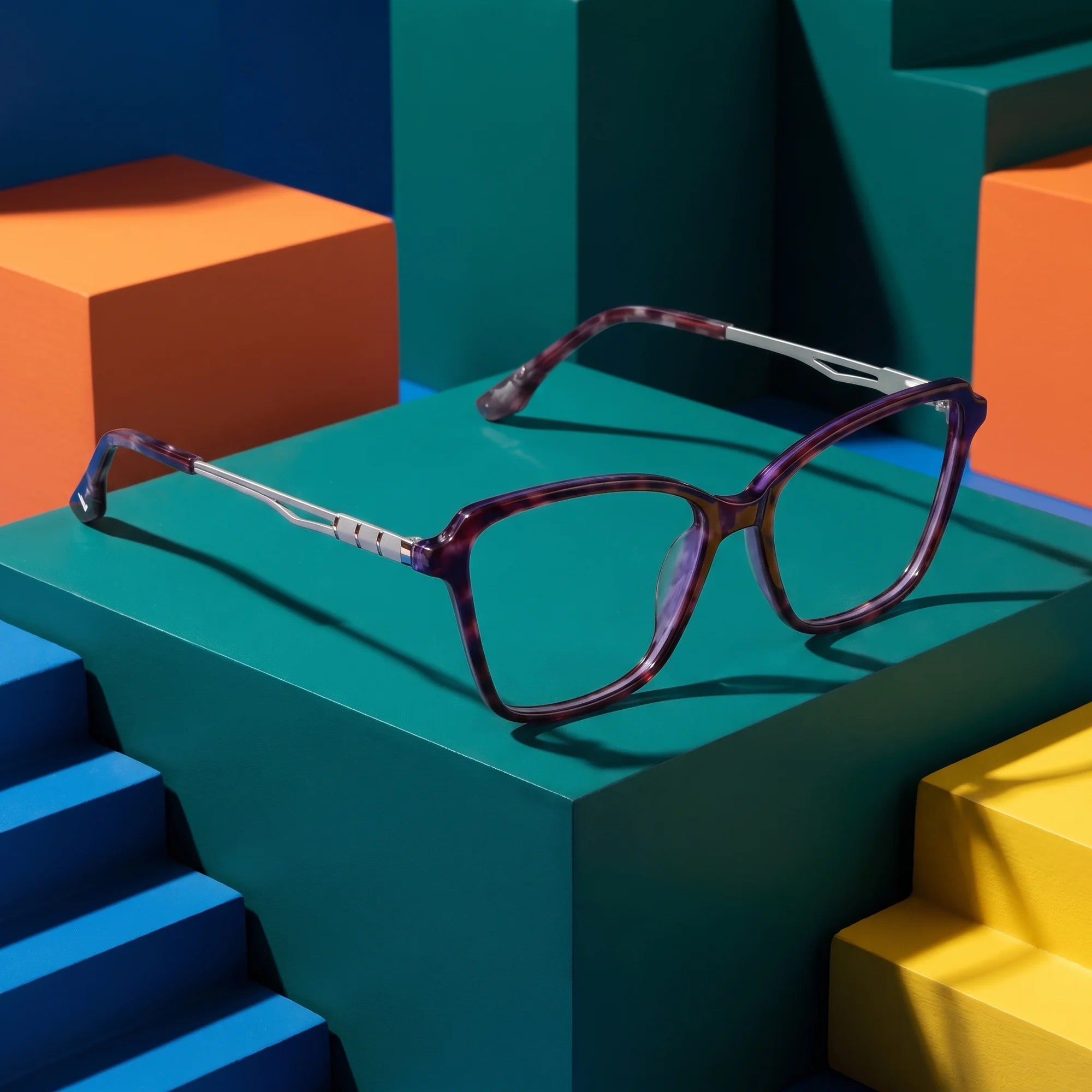 Fiore 1006 eyeglasses in purple – on bold primary color-block steps