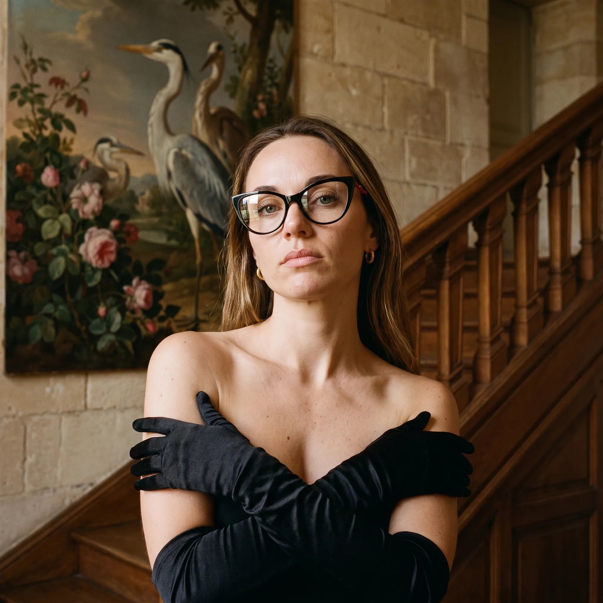 Fiore 1010 eyeglasses in black, worn by a model – campaign portrait, manor interior, heron painting and opera gloves