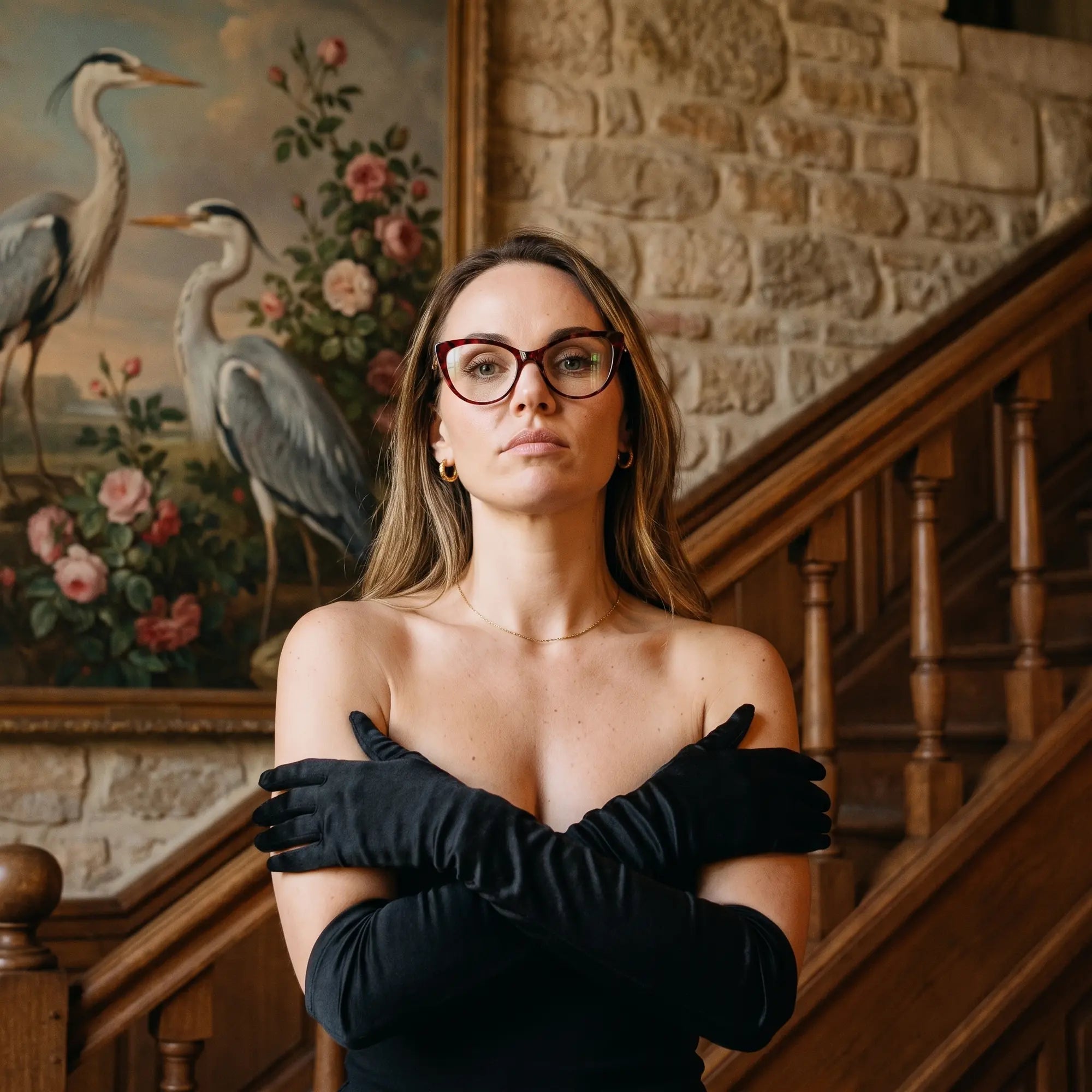 Fiore 1010 eyeglasses in red, worn by a model – campaign portrait, manor interior, heron painting and opera gloves