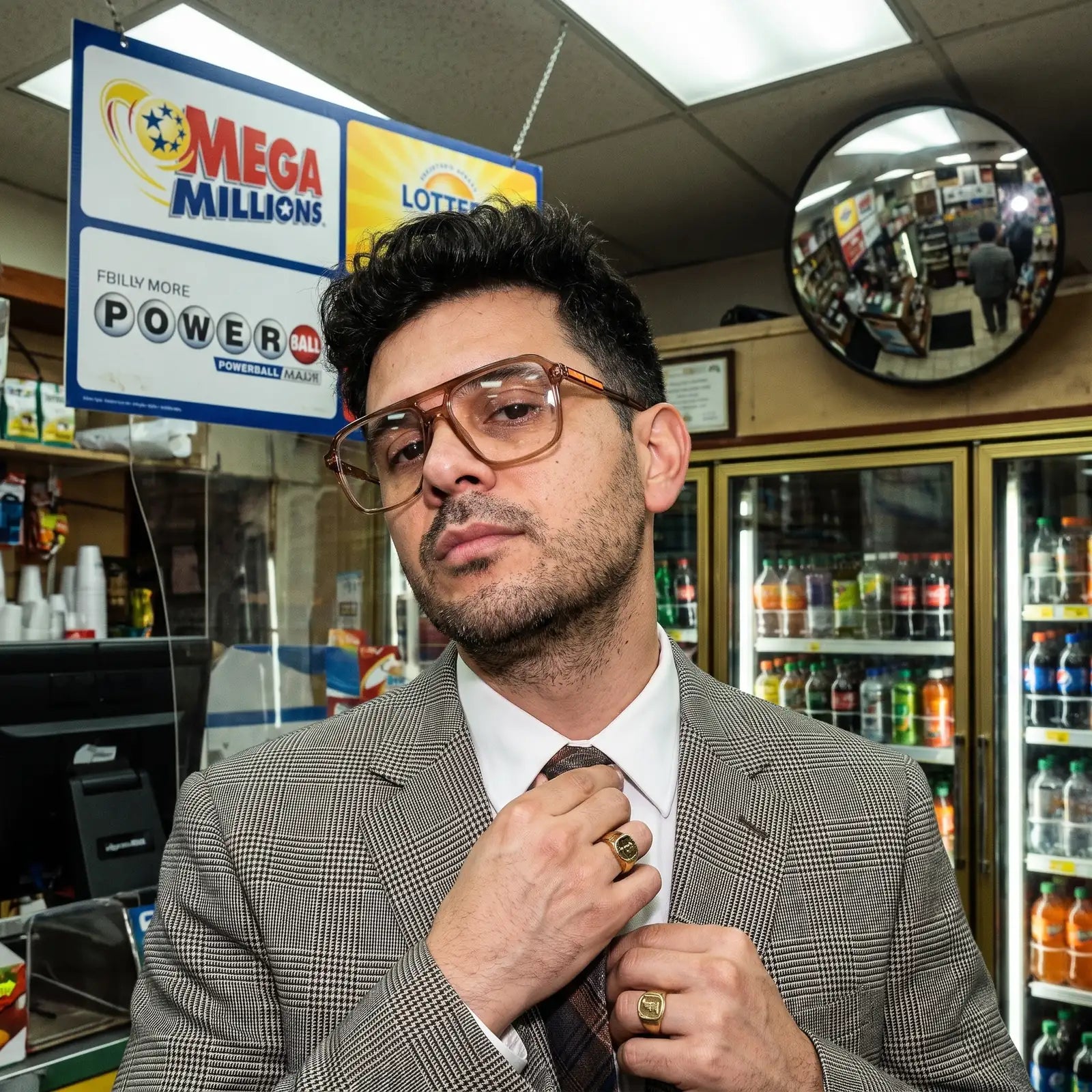 Fiore 1014 eyeglasses in brown, worn by a model – campaign portrait, city heritage portrait on a mural wall