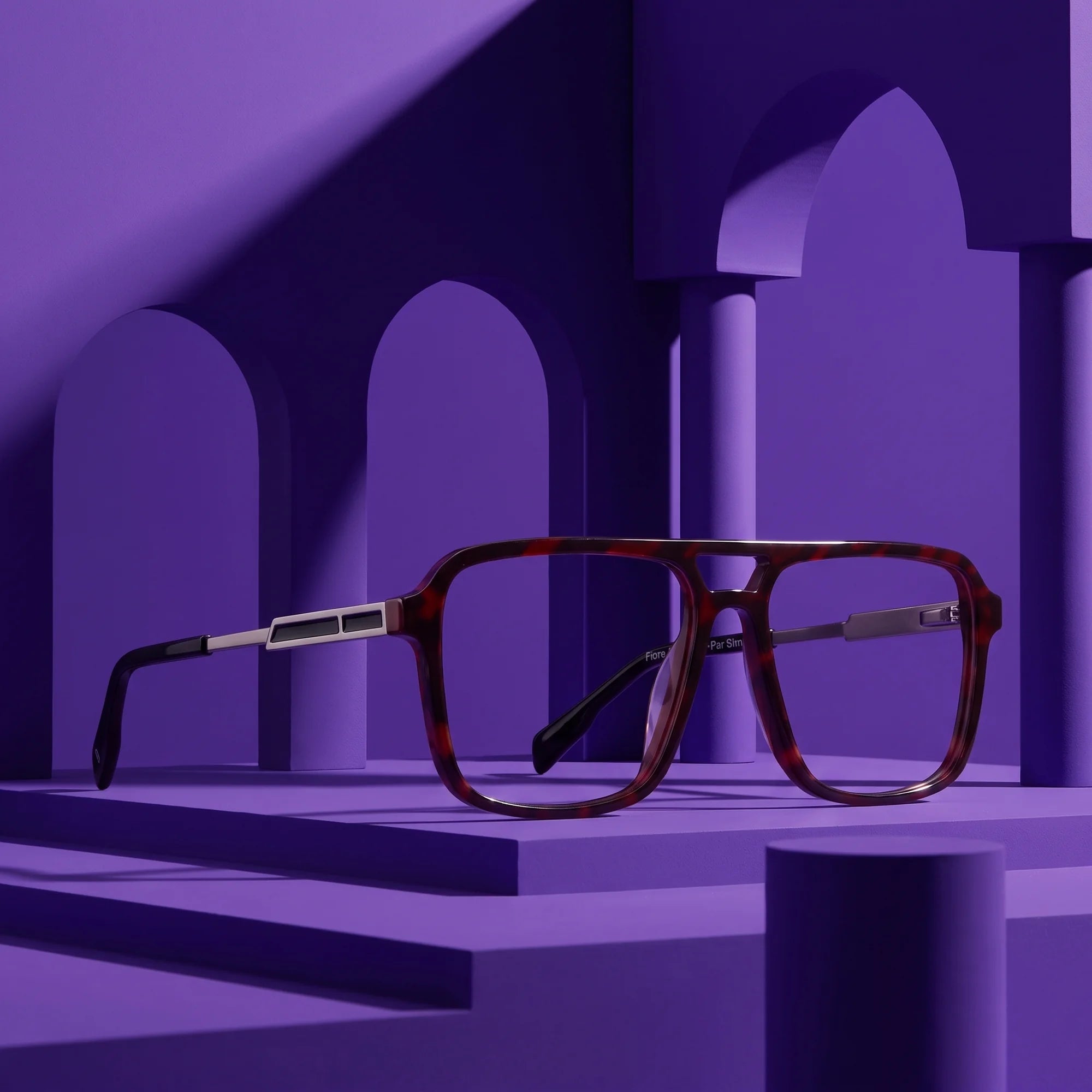 Fiore 1014 eyeglasses in tortoiseshell – staged on a sculptural violet architecture set