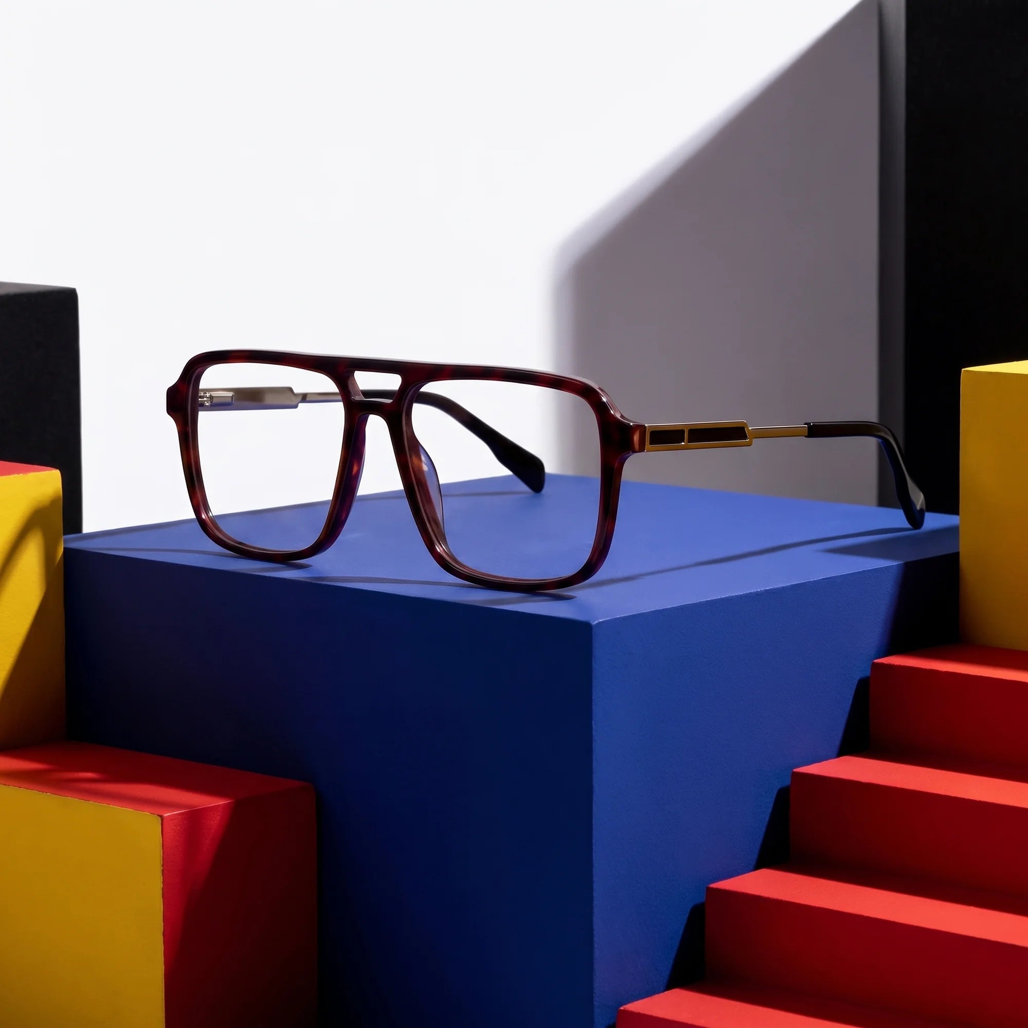 Fiore 1014 eyeglasses in tortoiseshell – on bold primary color-block steps