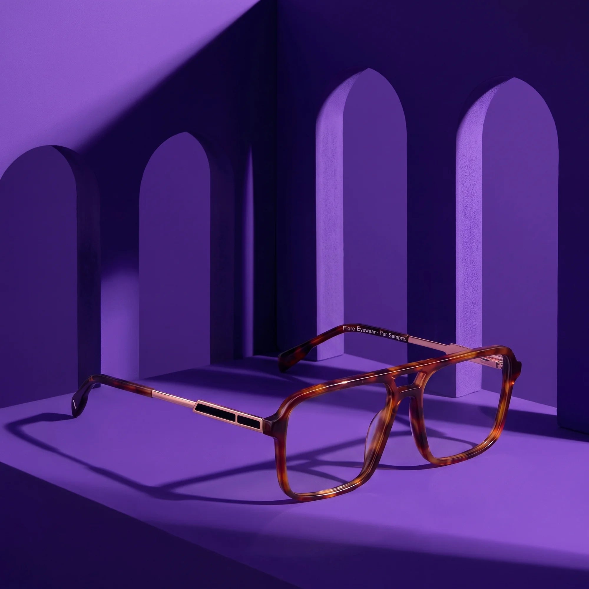 Fiore 1014 eyeglasses in brown tortoiseshell – staged on a sculptural violet architecture set