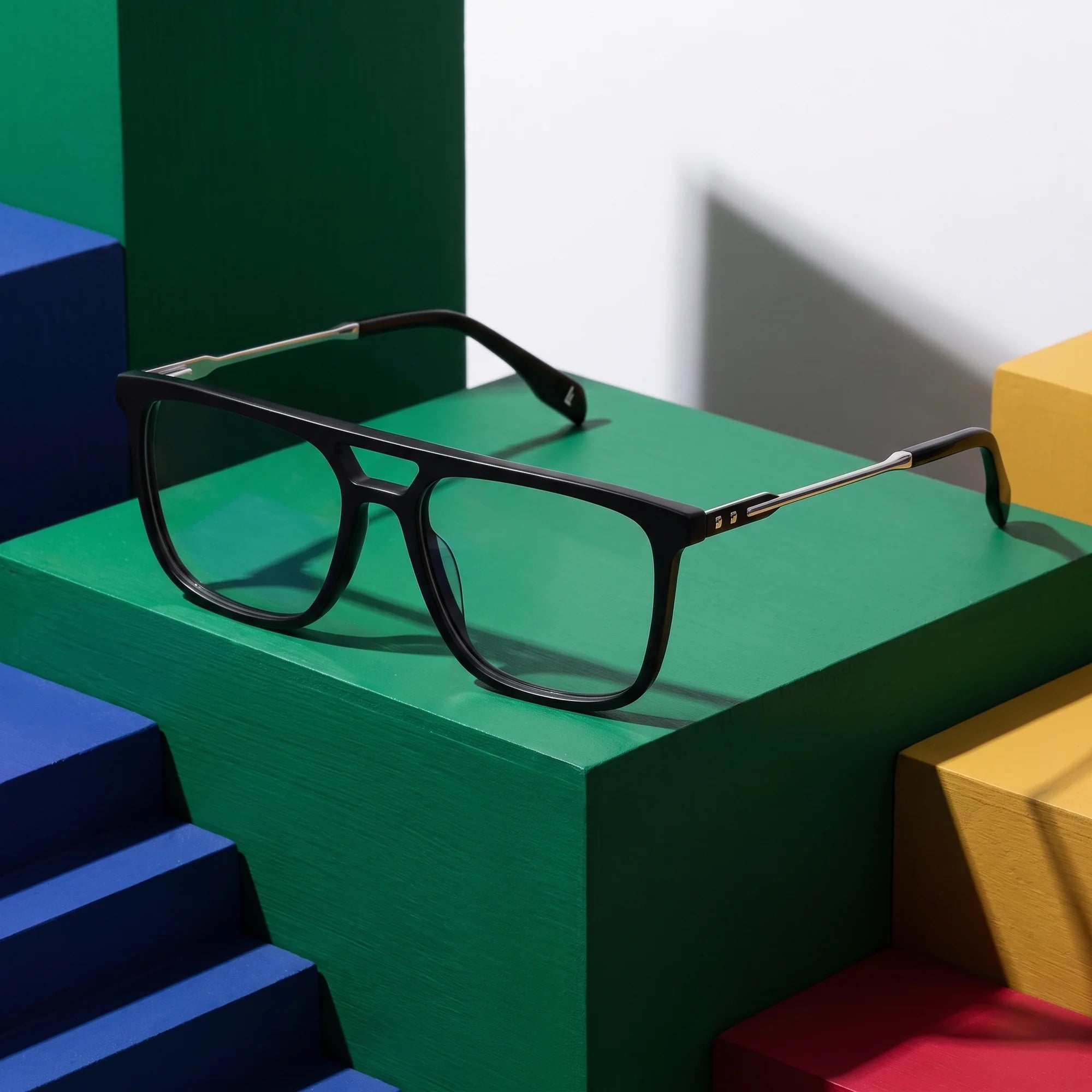Fiore 10177 eyeglasses in black – on bold primary color-block steps