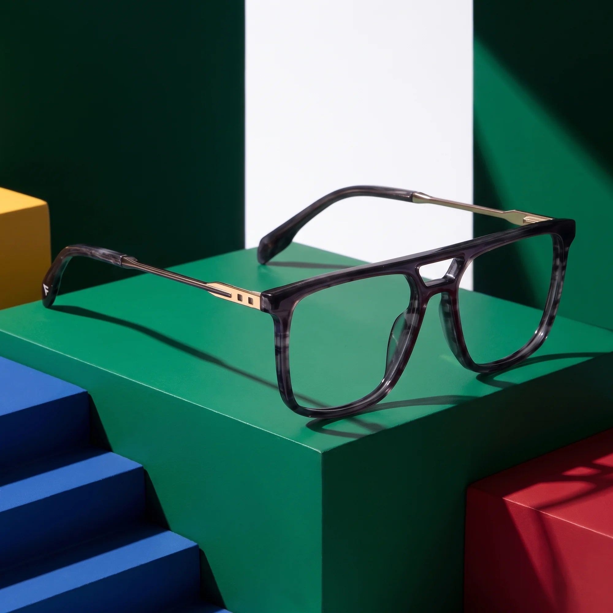 Fiore 10177 eyeglasses in grey – on bold primary color-block steps