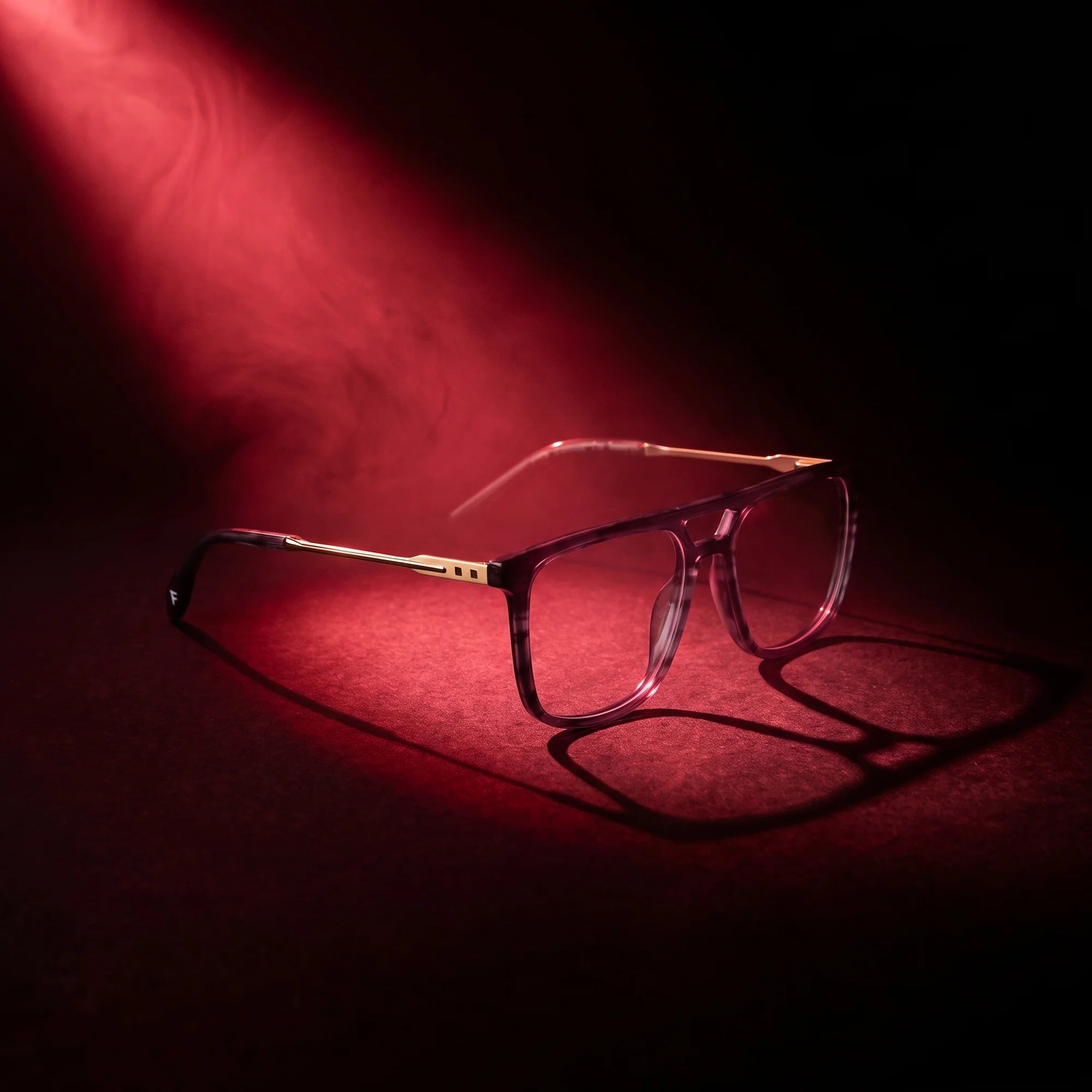 Fiore 10177 eyeglasses in grey – under a theatrical beam of light