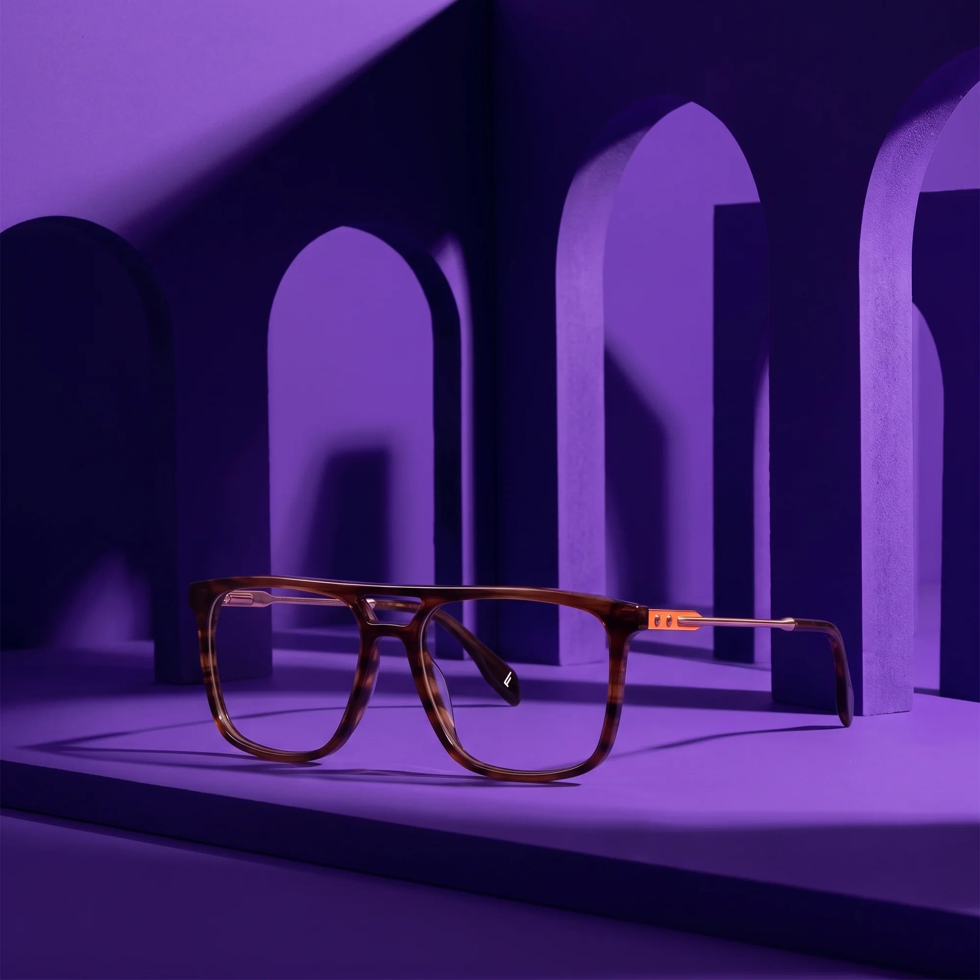 Fiore 10177 eyeglasses in tortoiseshell – staged on a sculptural violet architecture set