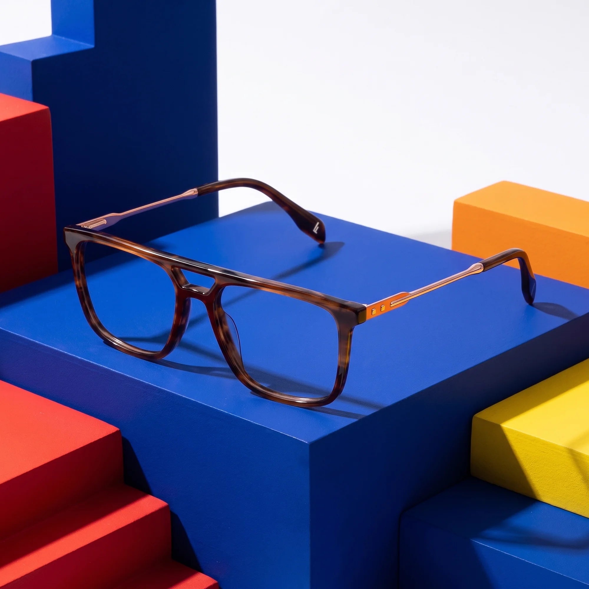 Fiore 10177 eyeglasses in tortoiseshell – on bold primary color-block steps