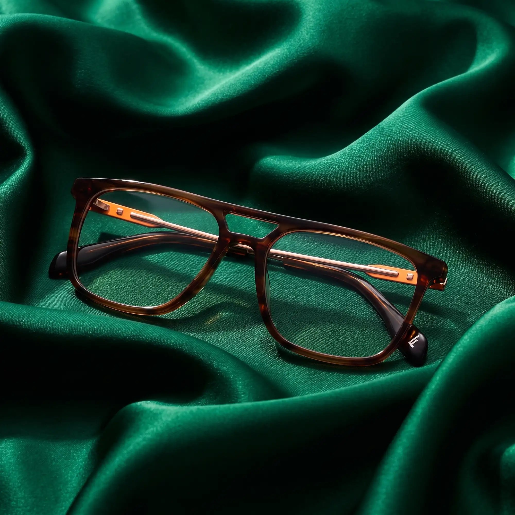 Fiore 10177 eyeglasses in tortoiseshell – nested in flowing emerald silk