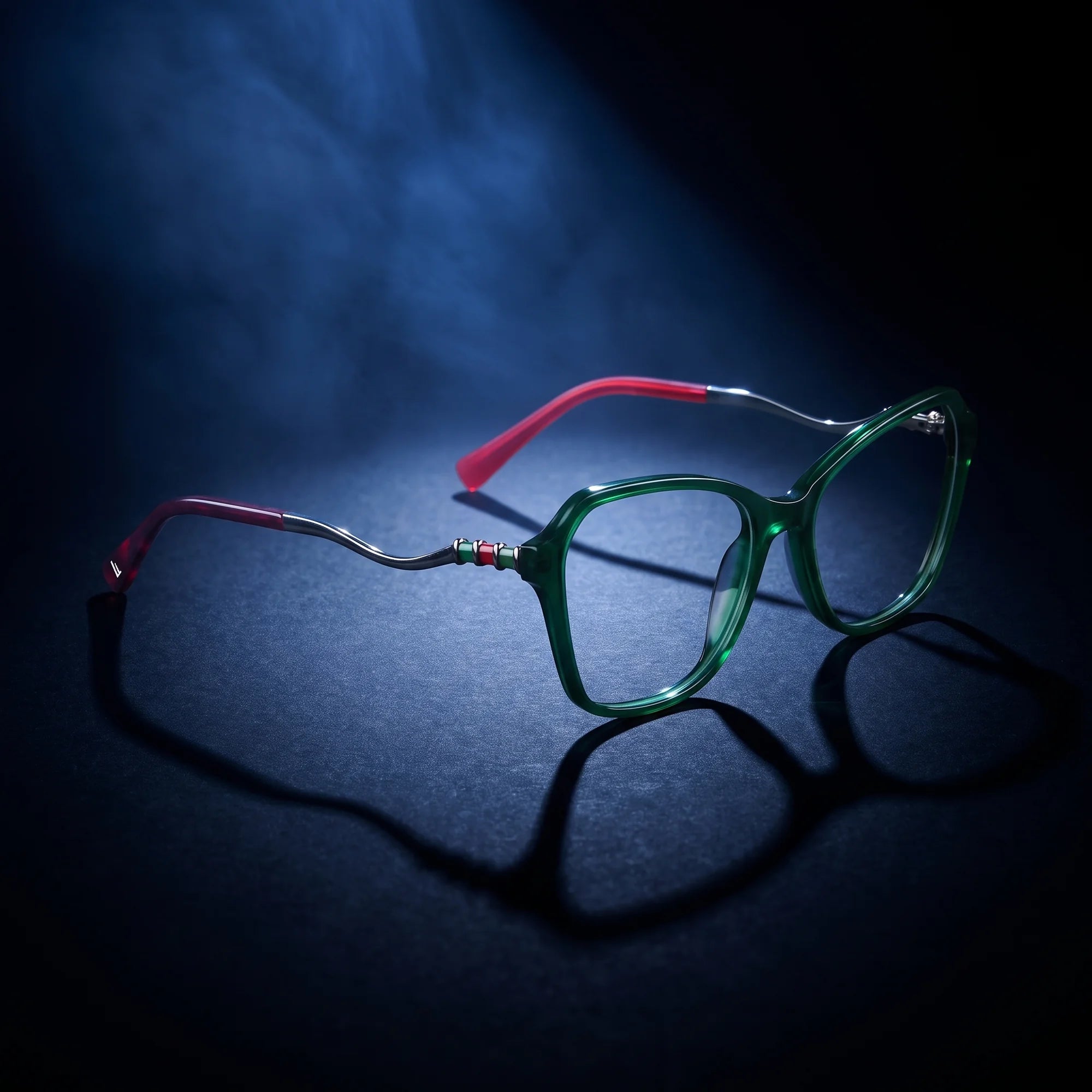 Fiore 1030 eyeglasses in green – under a theatrical beam of light