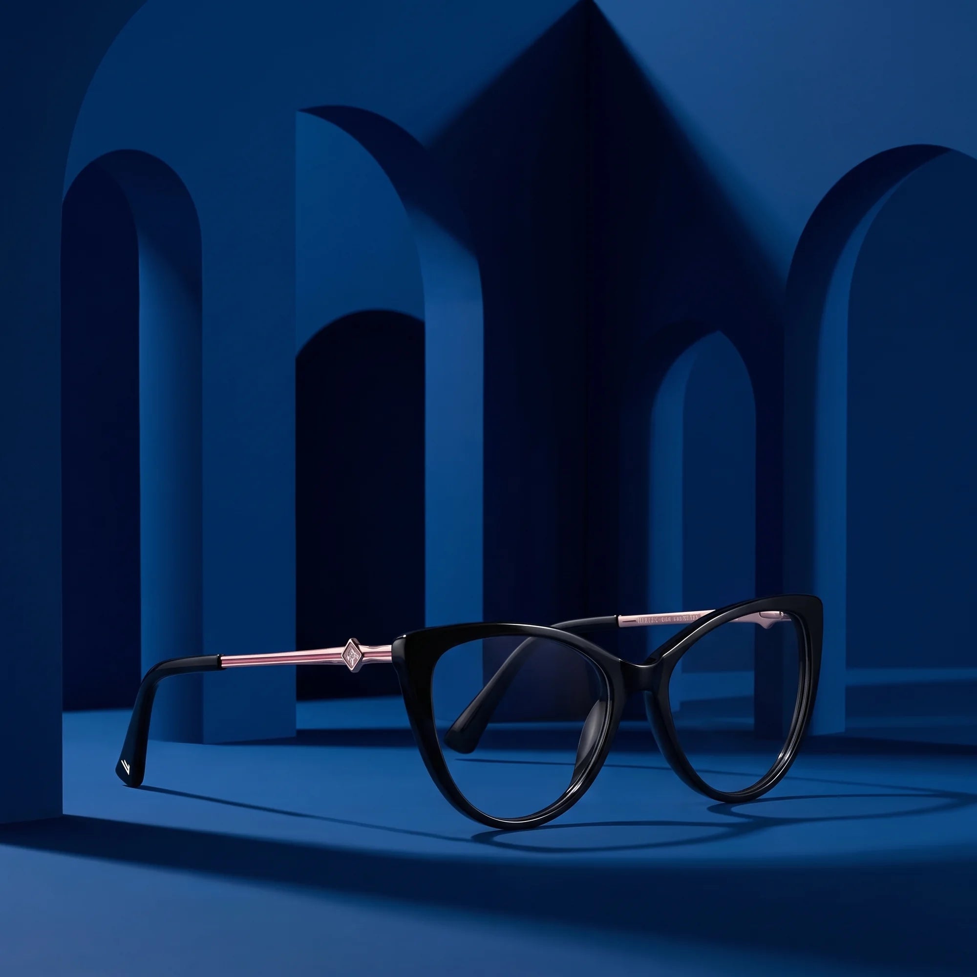Fiore 1031 eyeglasses in black – staged on a sculptural midnight blue architecture set