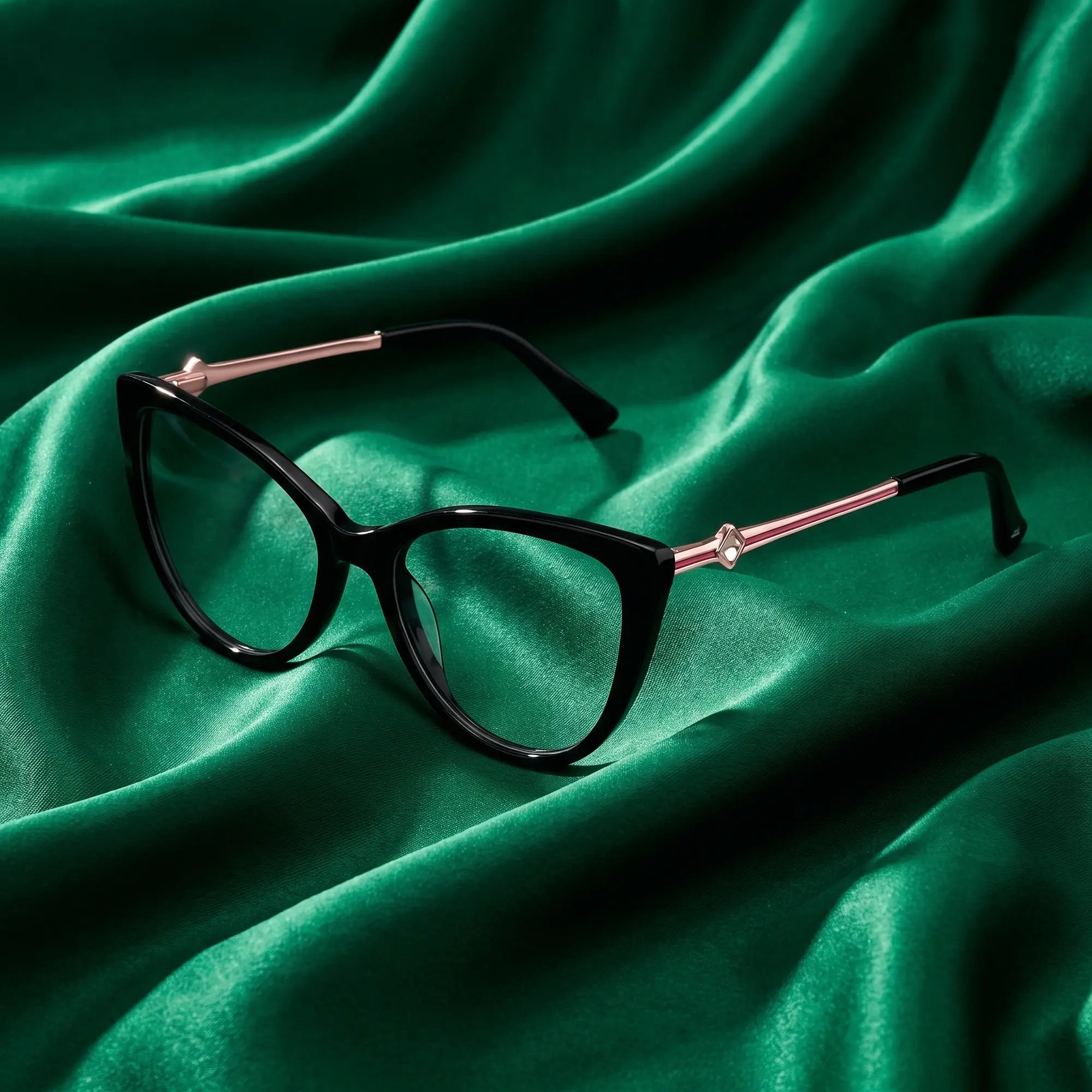 Fiore 1031 eyeglasses in black – nested in flowing emerald silk