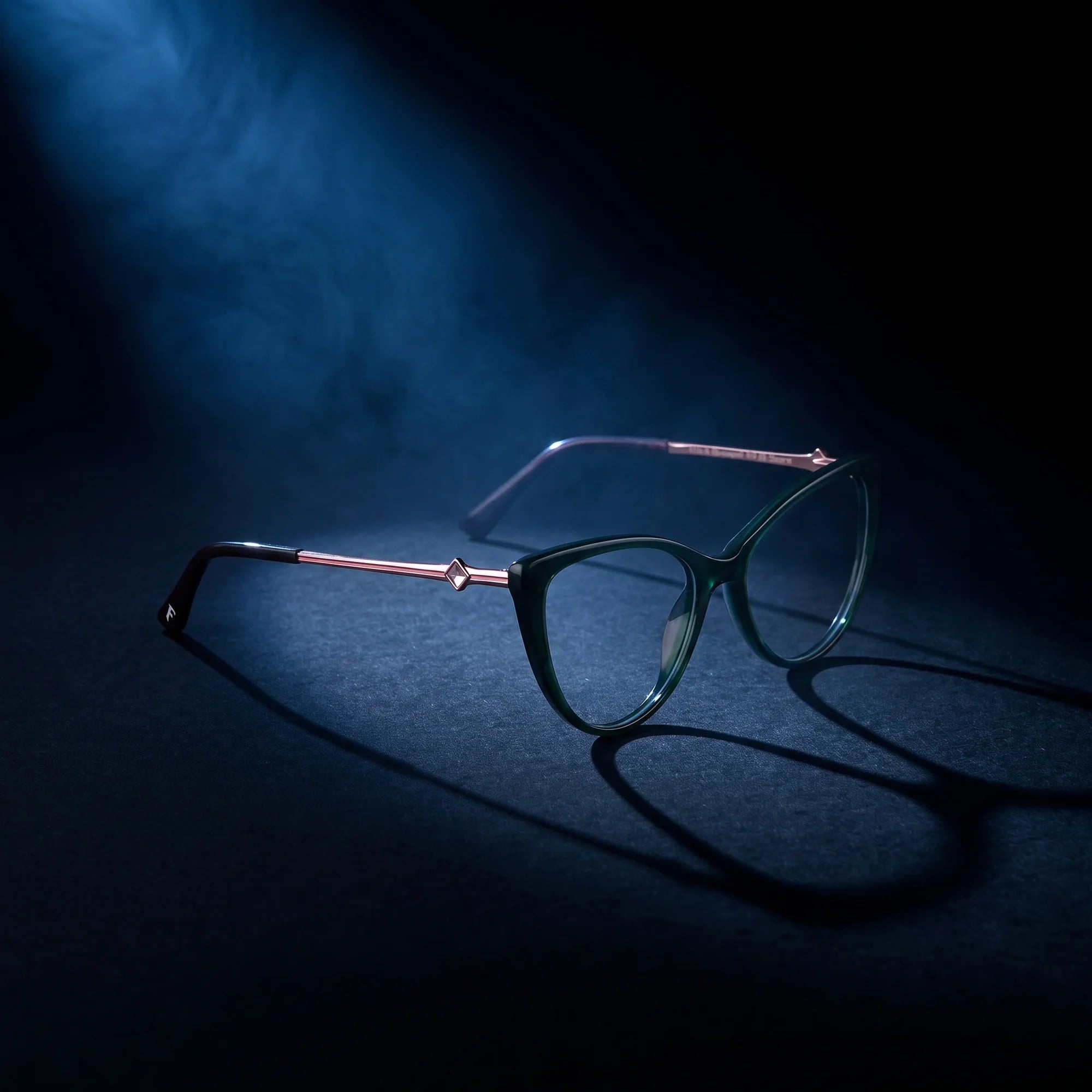 Fiore 1031 eyeglasses in green – under a theatrical beam of light