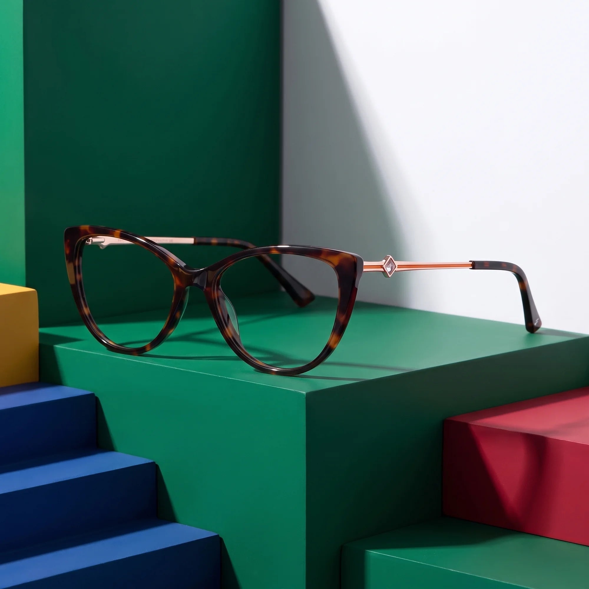 Fiore 1031 eyeglasses in tortoiseshell – on bold primary color-block steps