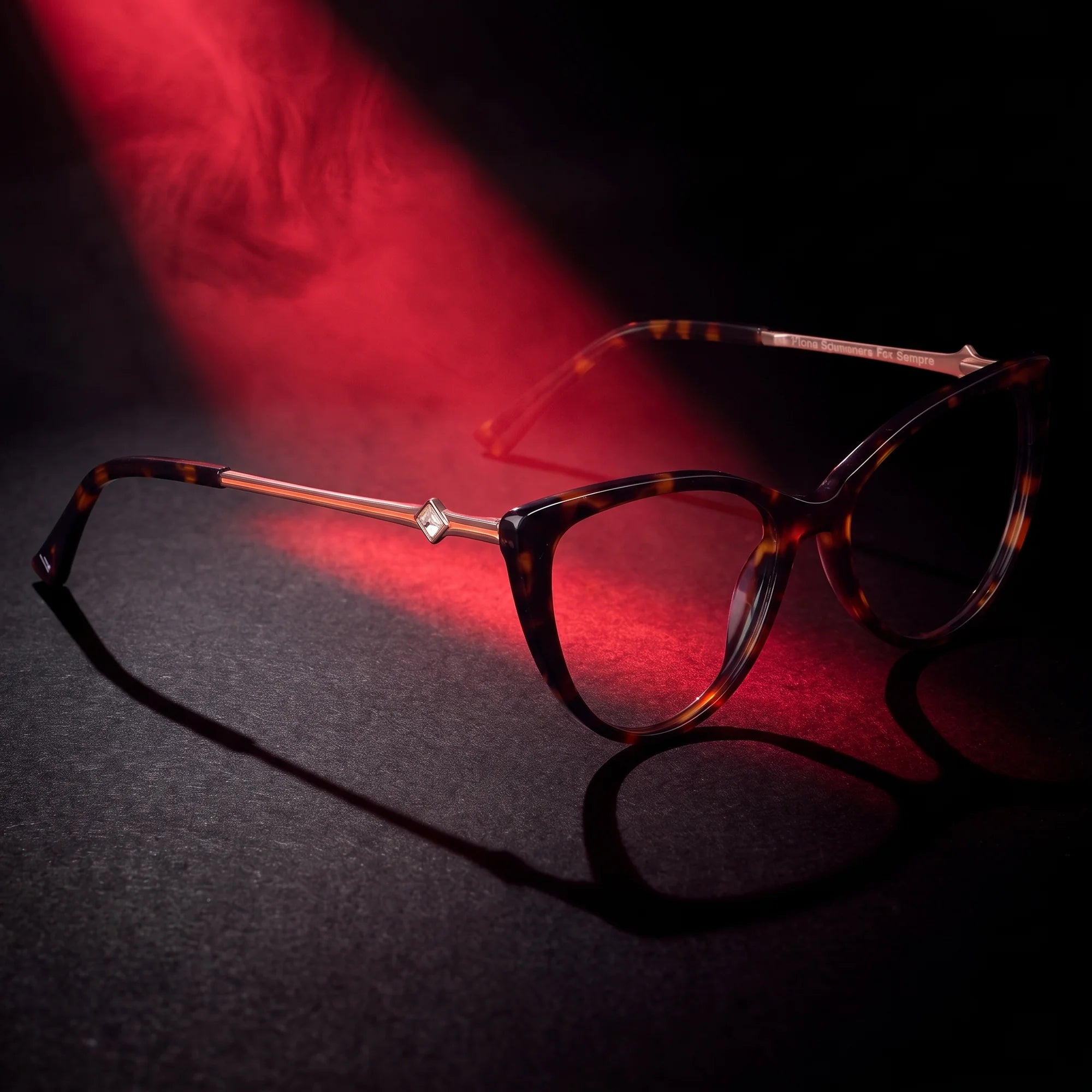 Fiore 1031 eyeglasses in tortoiseshell – under a theatrical beam of light
