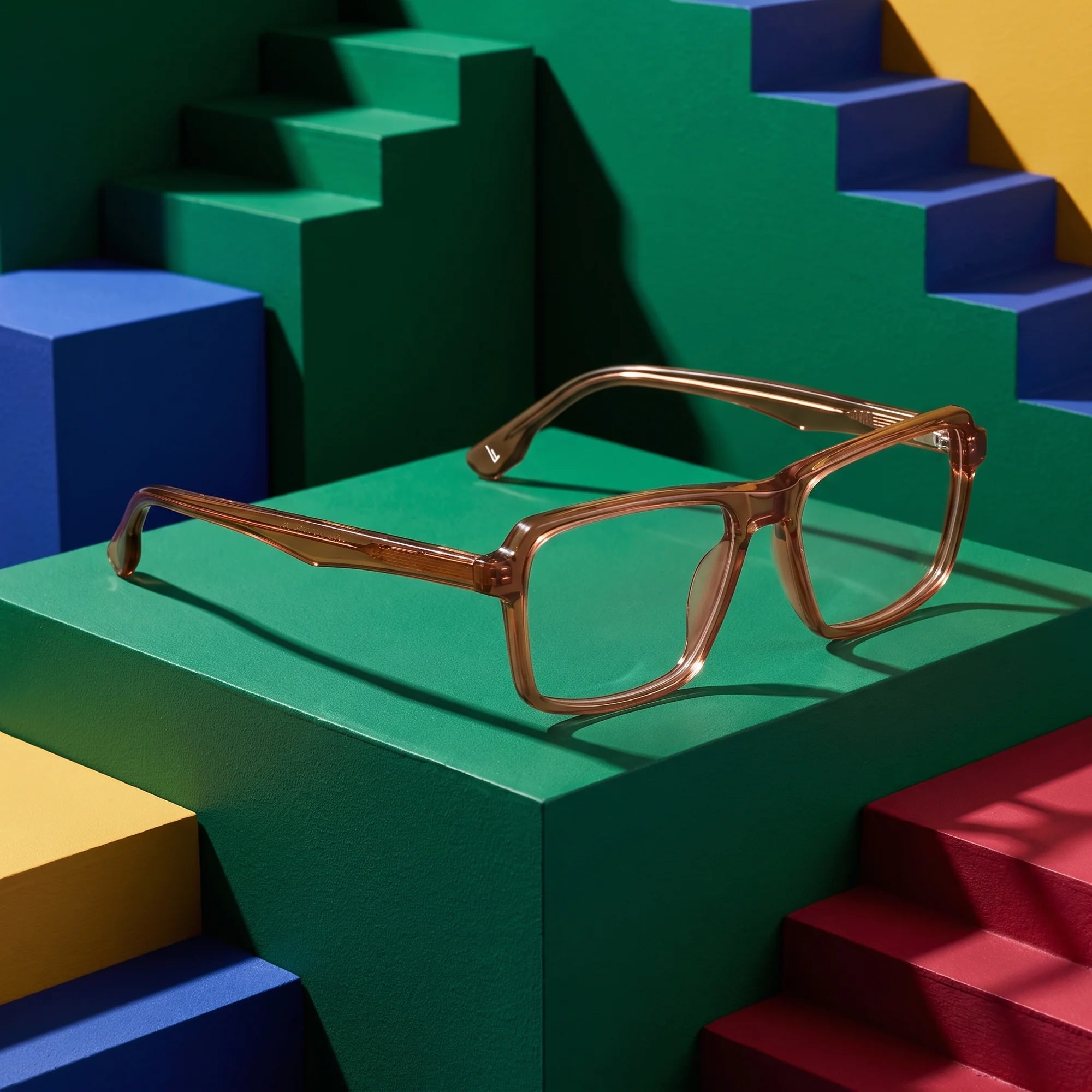 Fiore 1038 eyeglasses in brown – on bold primary color-block steps