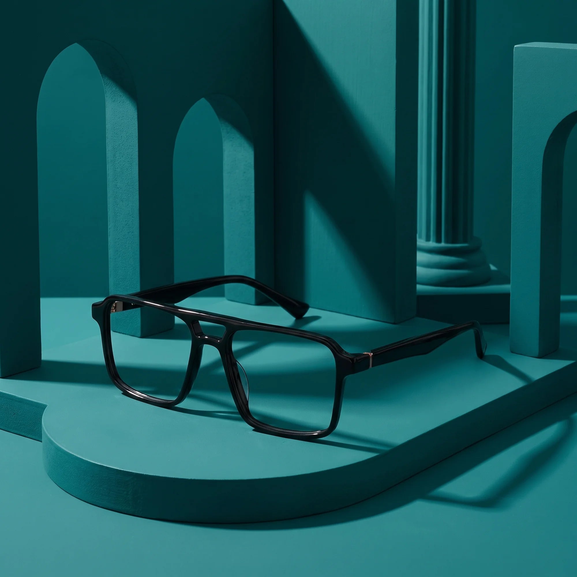 Fiore 1039 eyeglasses in black – still life among monochrome teal arches