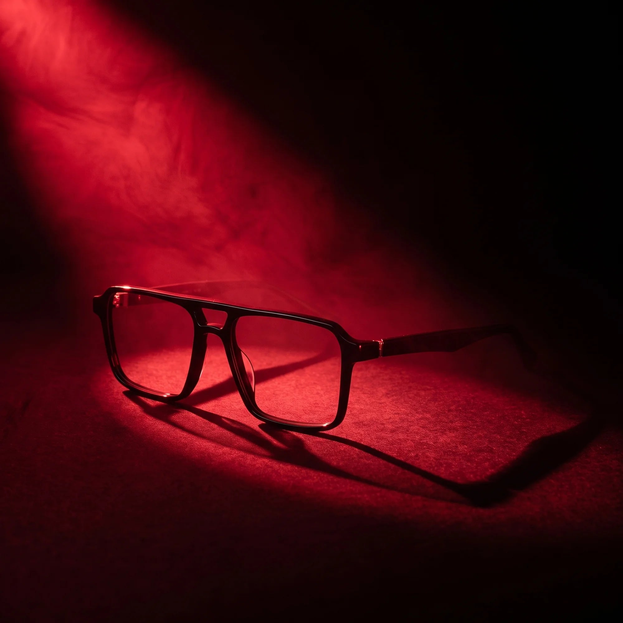 Fiore 1039 eyeglasses in black – under a theatrical beam of light