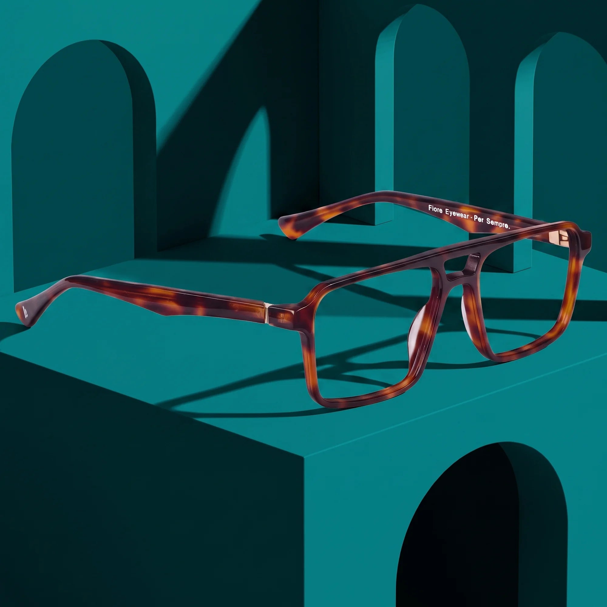 Fiore 1039 eyeglasses in tortoiseshell – still life among monochrome teal arches