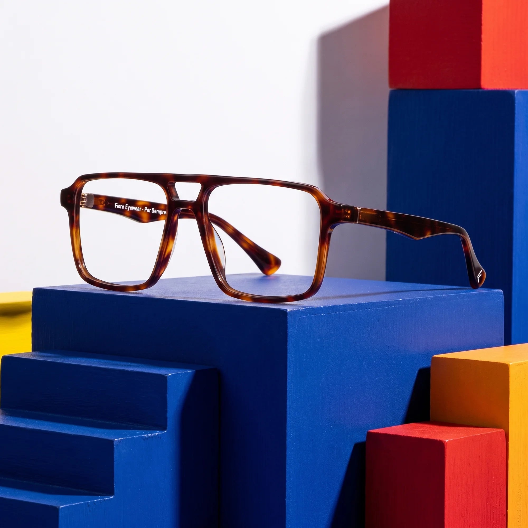 Fiore 1039 eyeglasses in tortoiseshell – on bold primary color-block steps