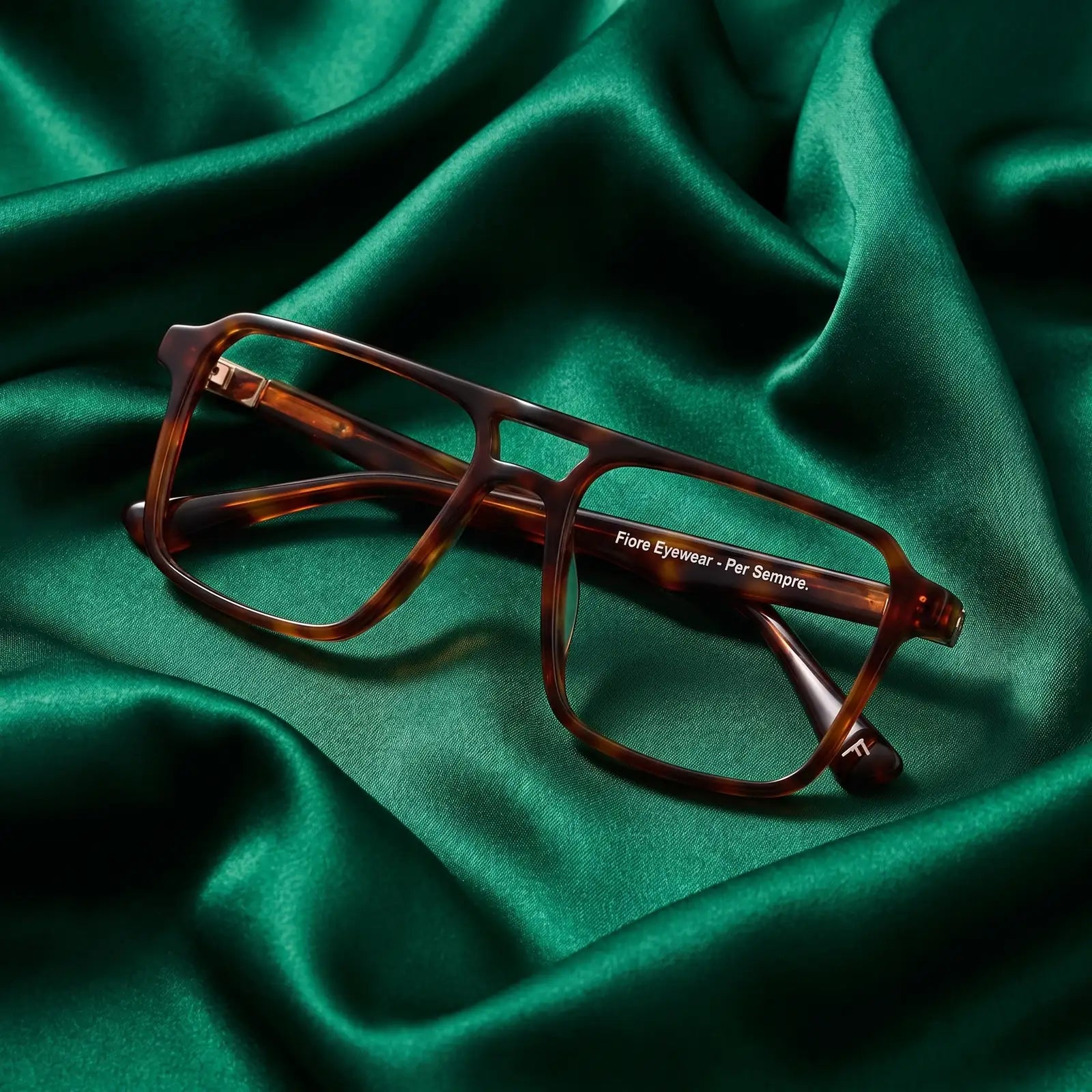 Fiore 1039 eyeglasses in tortoiseshell – nested in flowing emerald silk