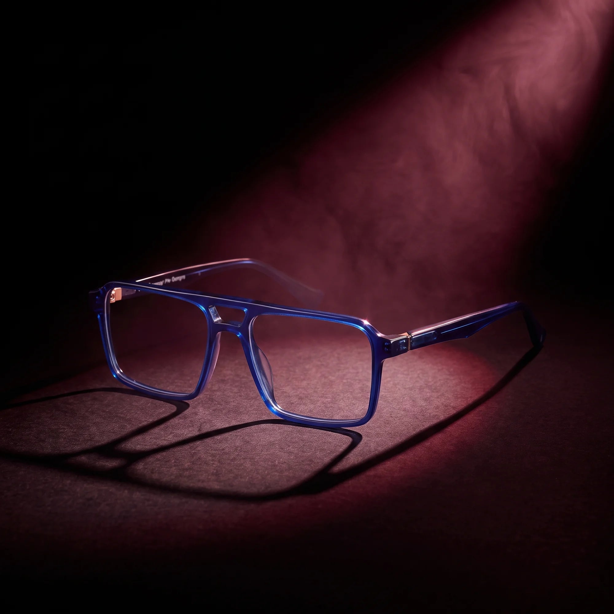 Fiore 1039 eyeglasses in blue – under a theatrical beam of light