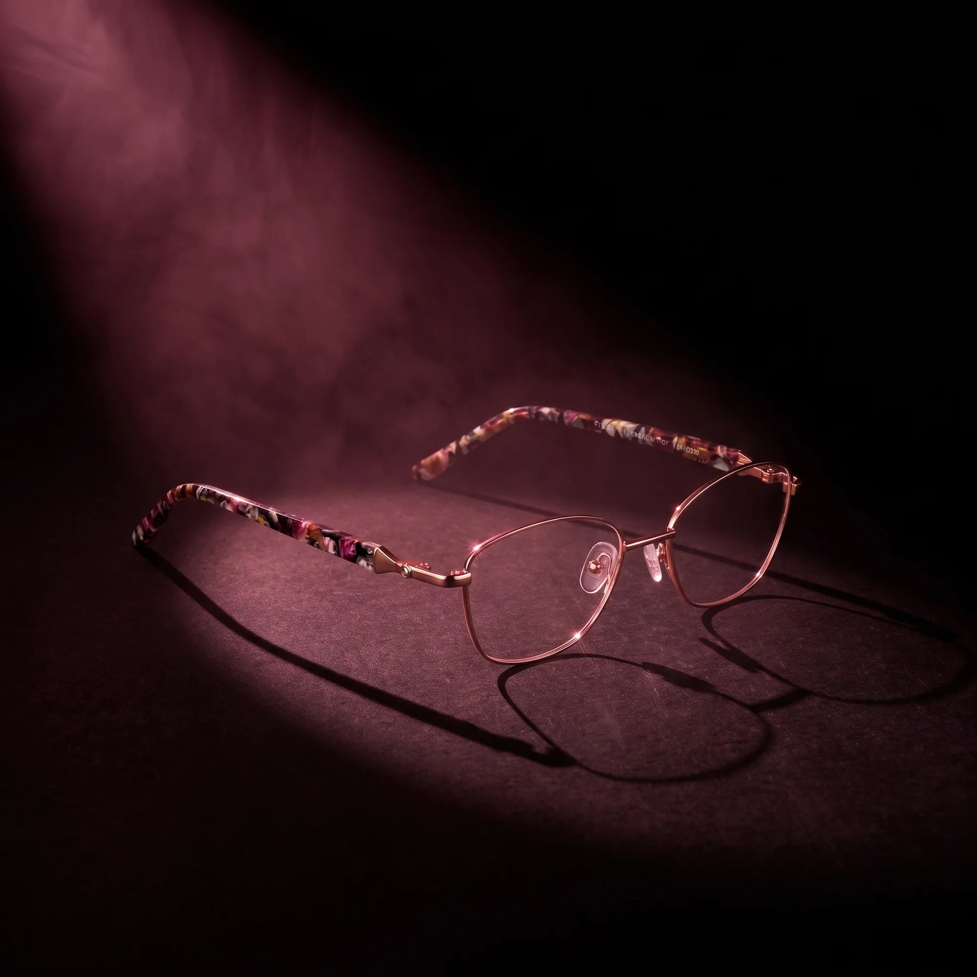 Fiore 2208 eyeglasses in brown tortoiseshell – under a theatrical beam of light