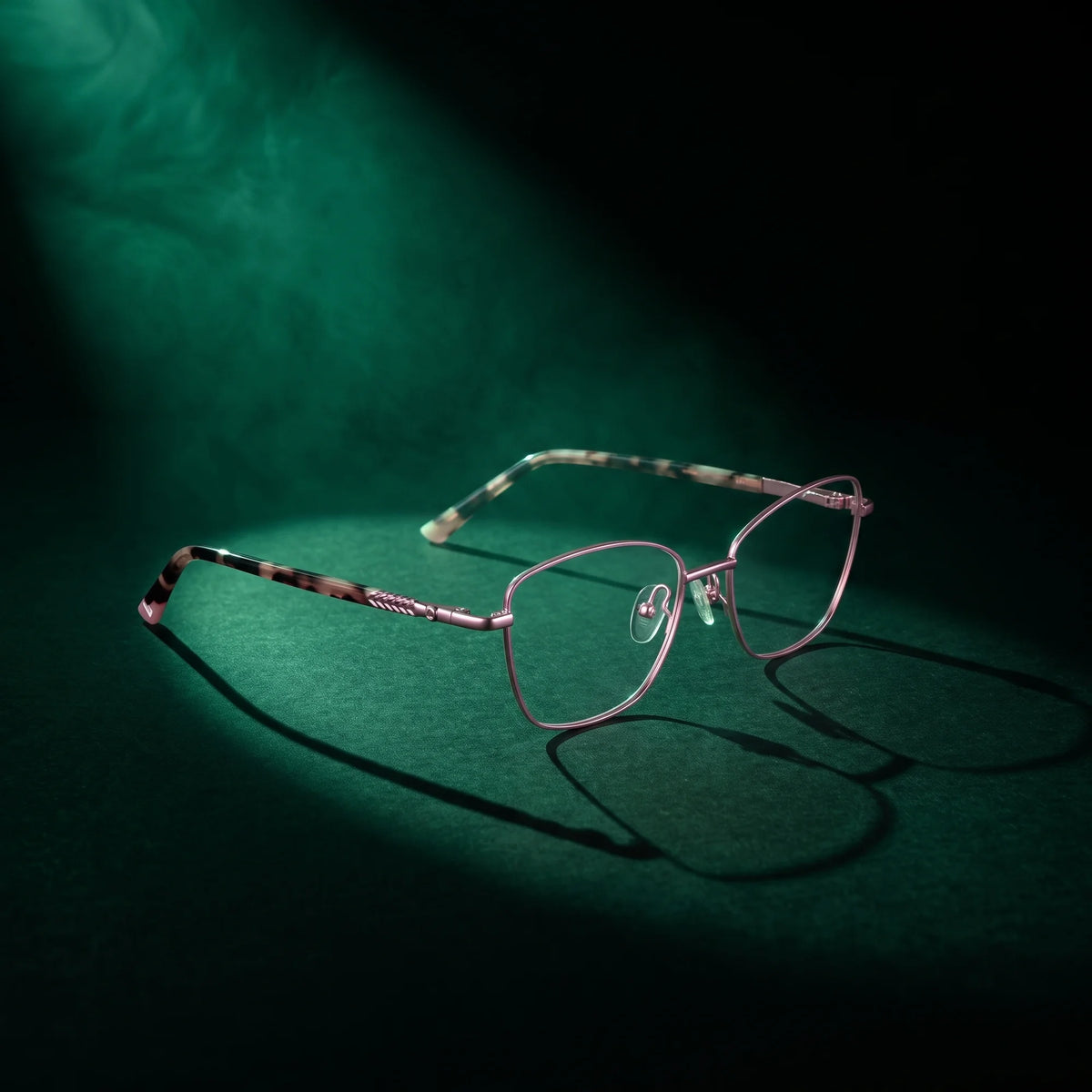 Fiore 2210 eyeglasses in pink – under a theatrical beam of light