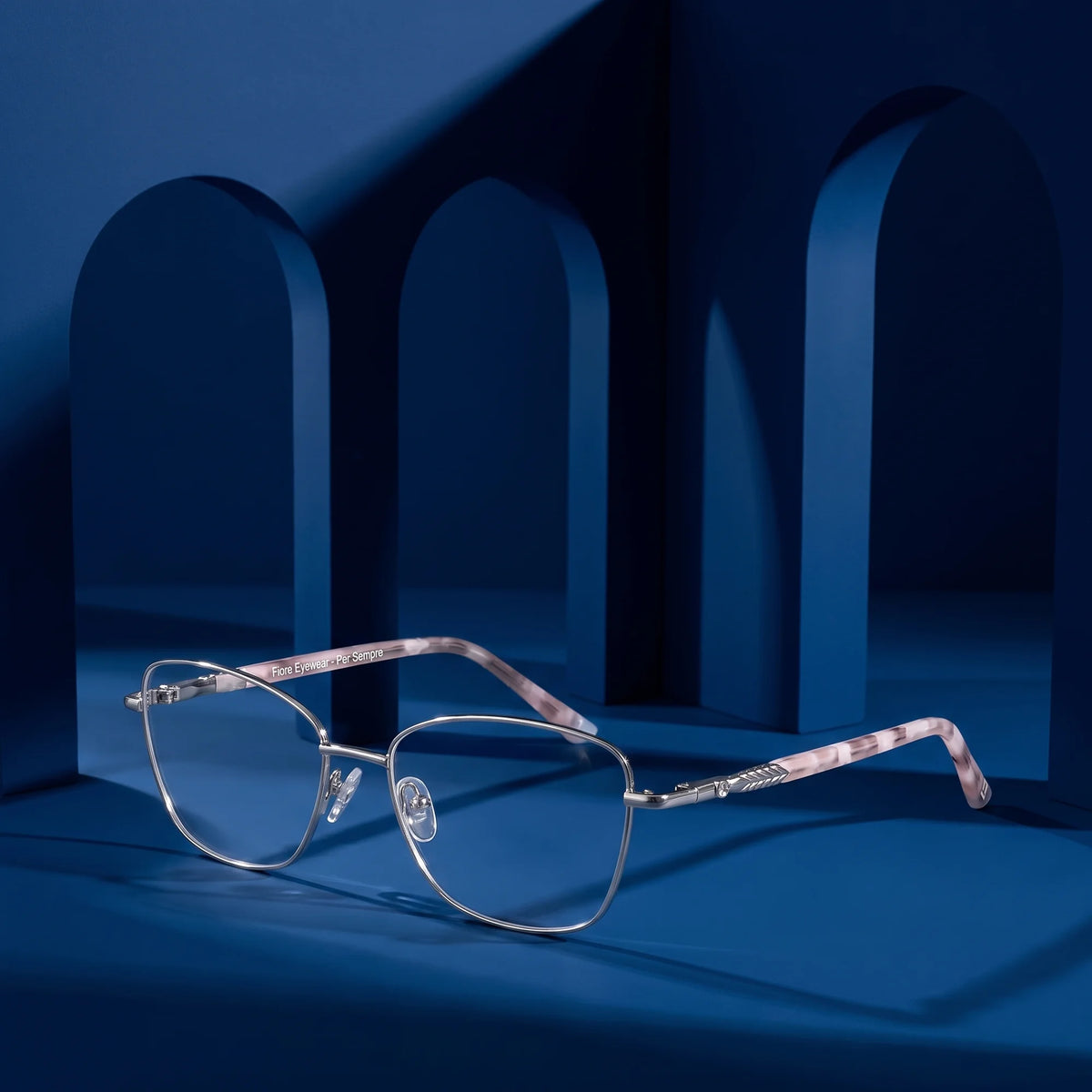 Fiore 2210 eyeglasses in silver black – still life among monochrome midnight blue arches