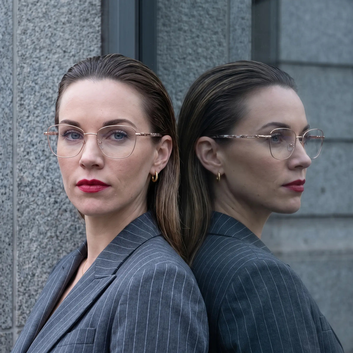 Fiore 2210 eyeglasses in gold brown, worn by a model – campaign portrait, overcast-city autumn street style