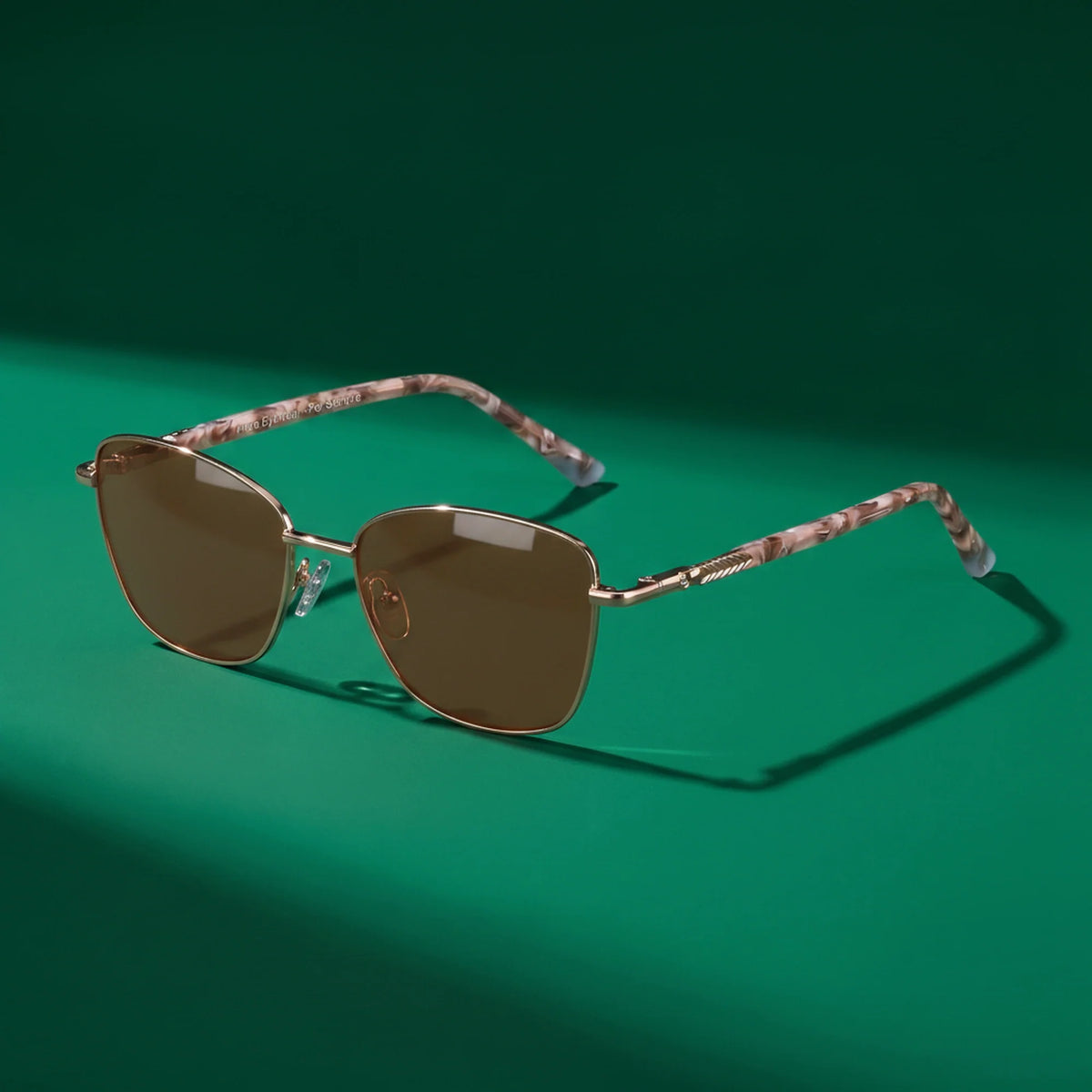 Fiore 2210 square cat eye sunglasses, gold steel frame, editorial still (angle 2) · ReFramed