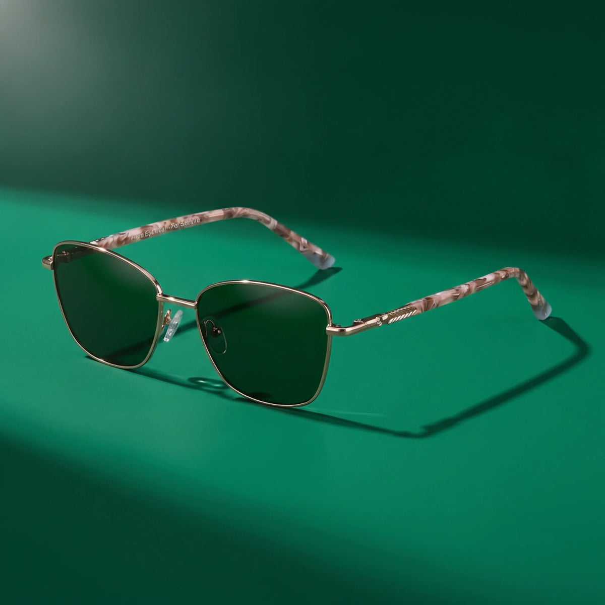 Fiore 2210 square cat eye sunglasses, gold steel frame, editorial still (angle 3) · ReFramed