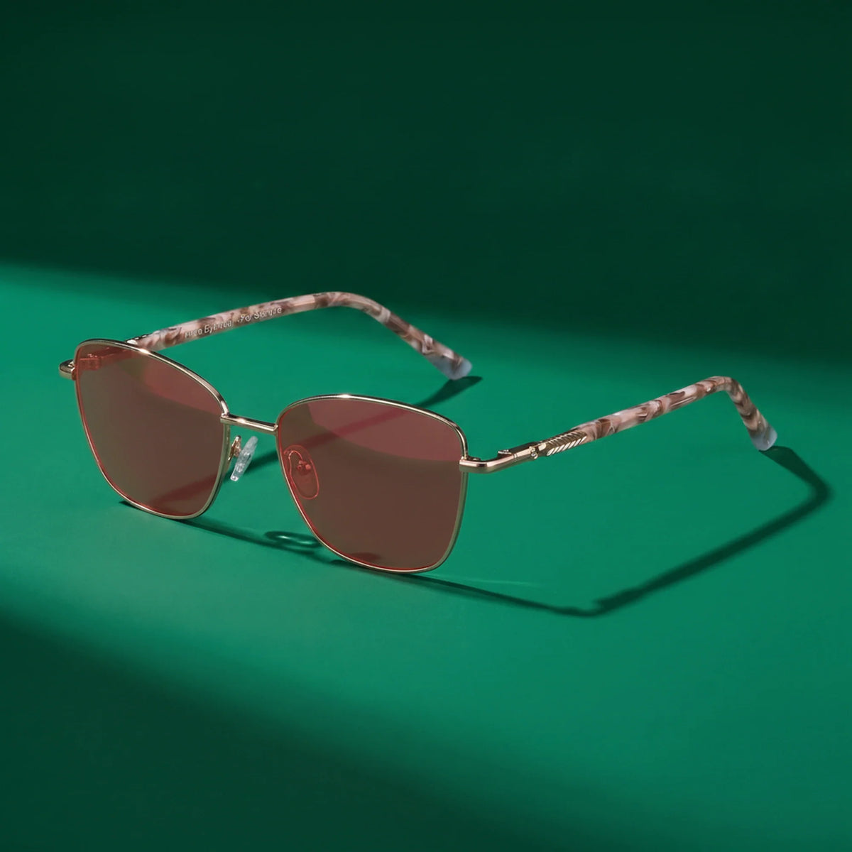 Fiore 2210 square cat eye sunglasses, gold steel frame, editorial still (angle 6) · ReFramed