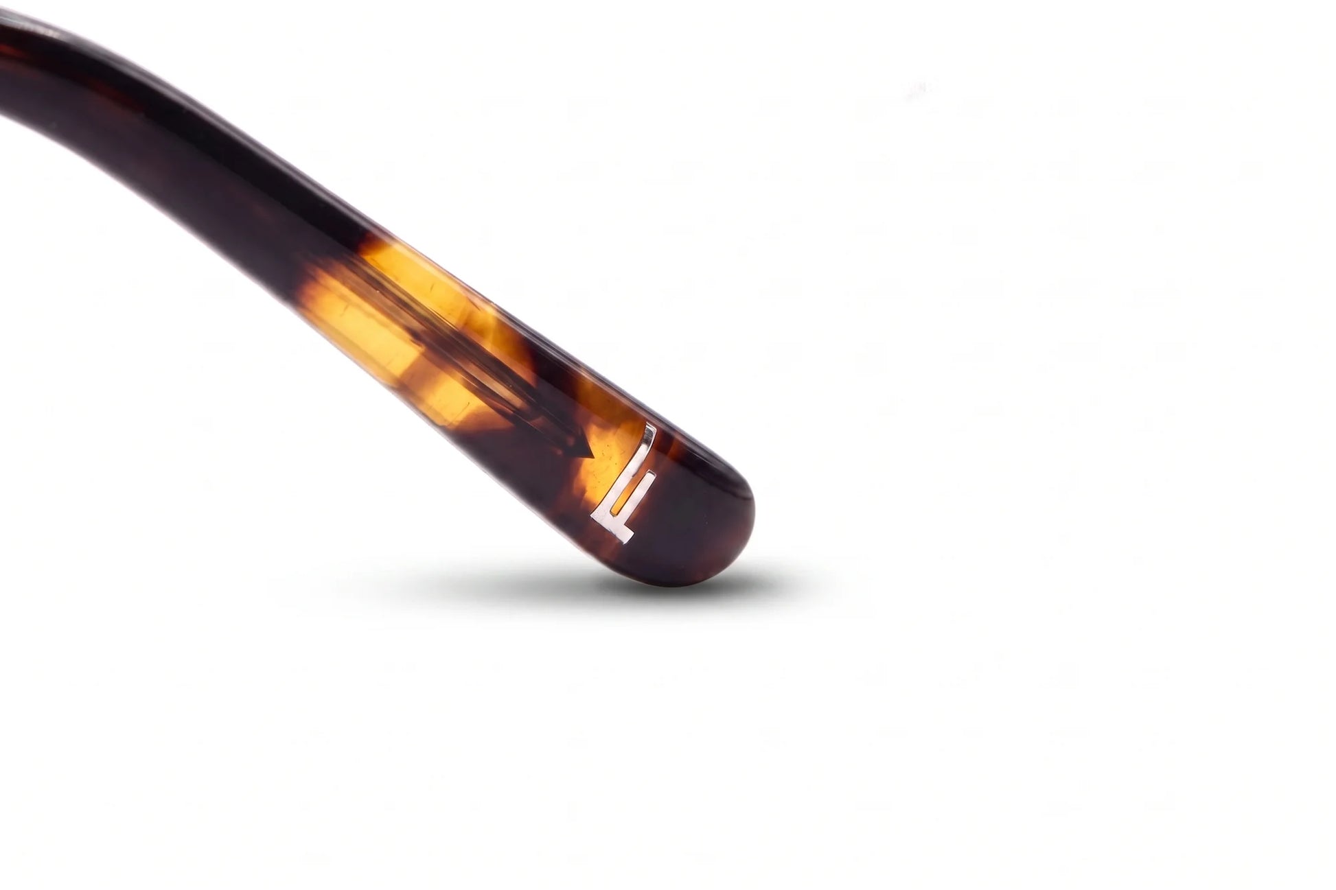 Fiore 22115 eyeglasses in brown – temple logo detail