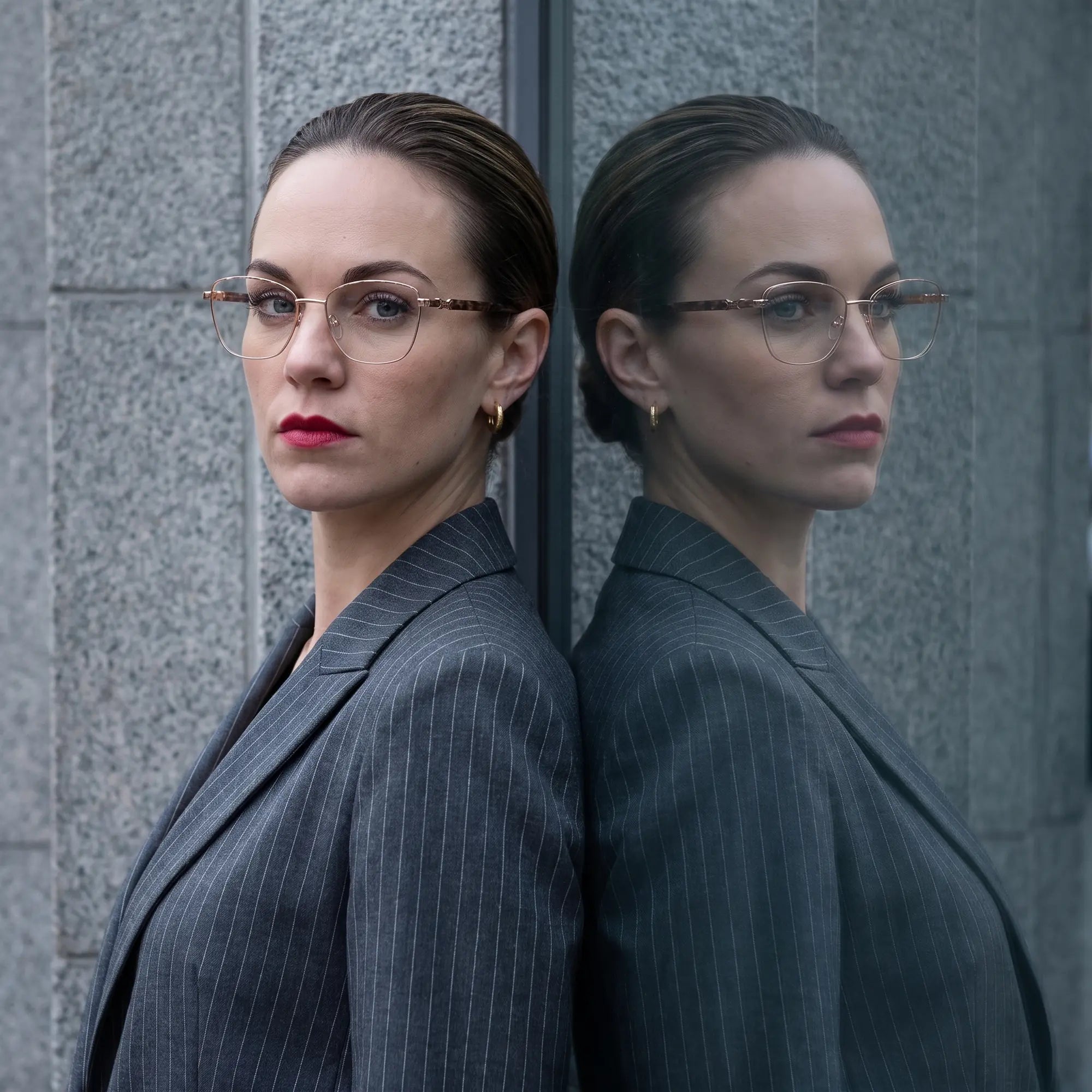 Fiore 22115 eyeglasses in gold, worn by a model – campaign portrait, overcast-city autumn street style