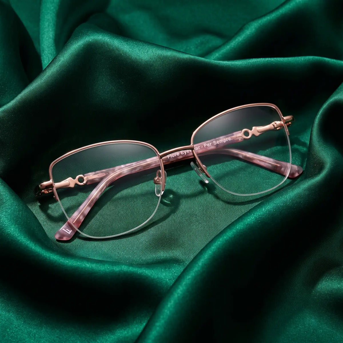 Fiore 22117 eyeglasses in gold – nested in flowing saturated color silk