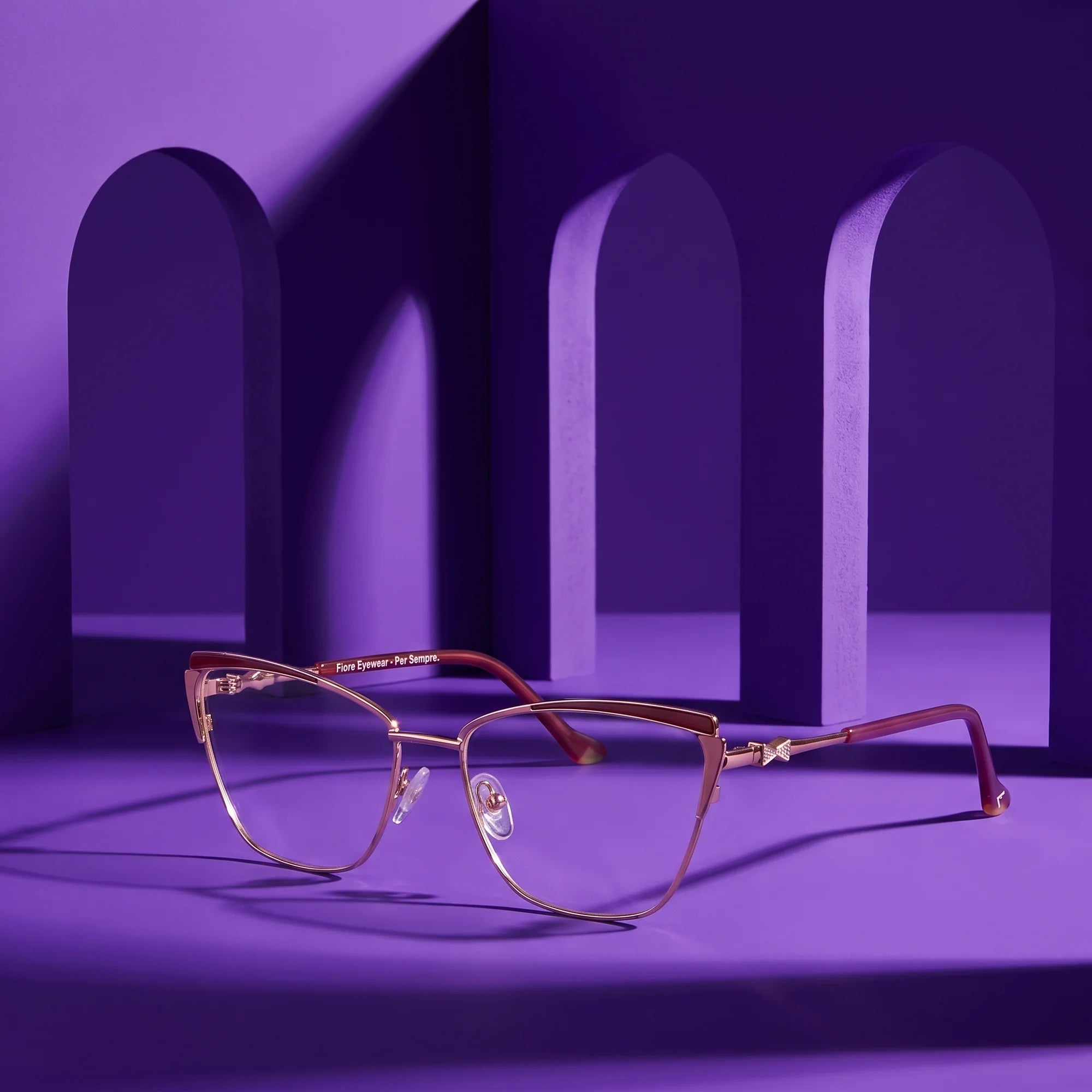 Fiore 3837 eyeglasses in red gold – still life among monochrome violet arches