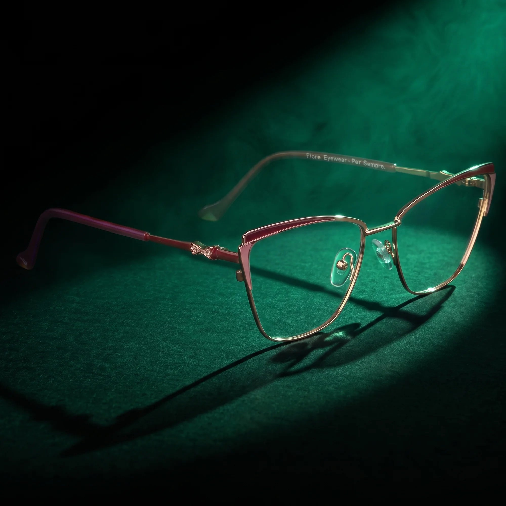 Fiore 3837 eyeglasses in red gold – under a theatrical beam of light