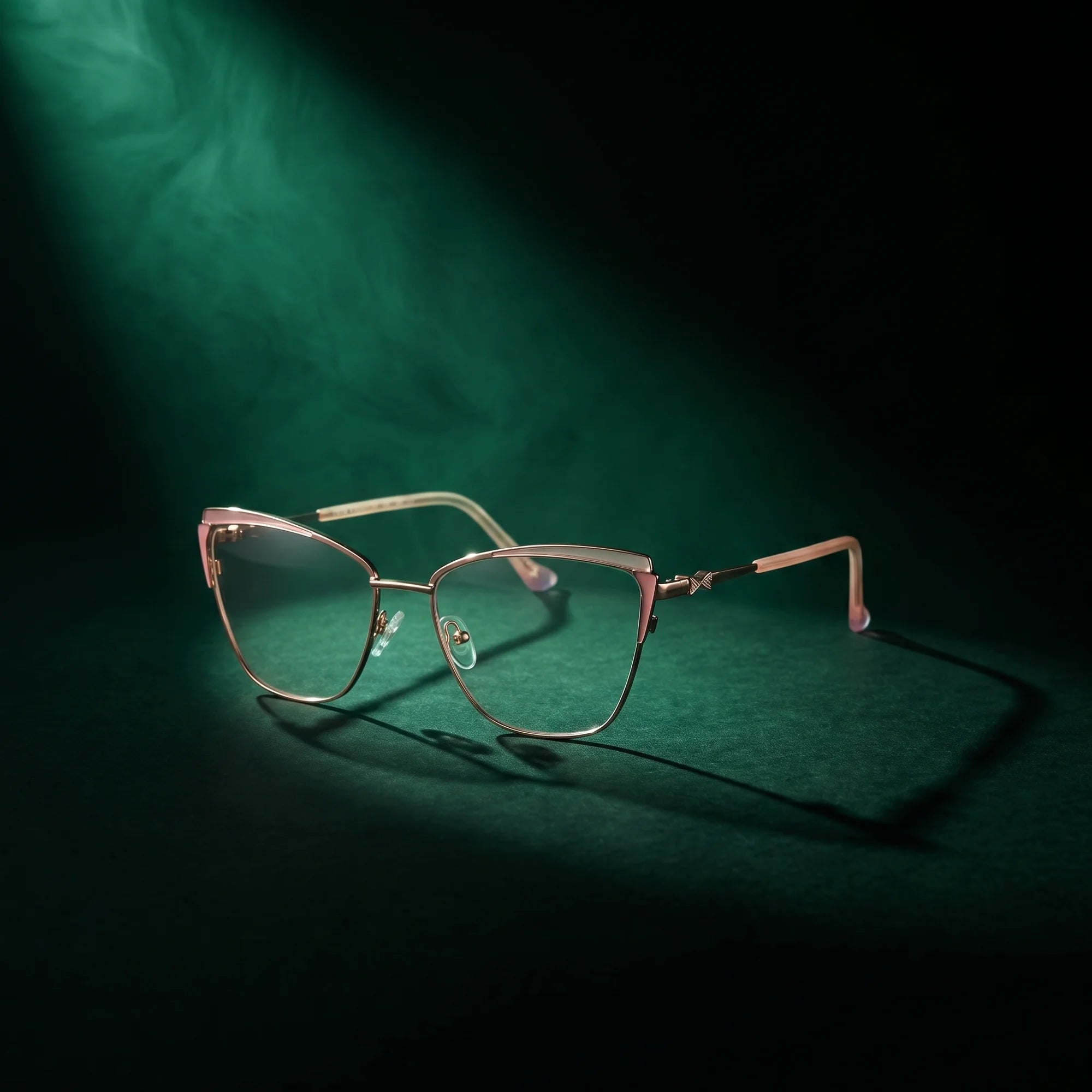Fiore 3837 eyeglasses in pink gold – under a theatrical beam of light