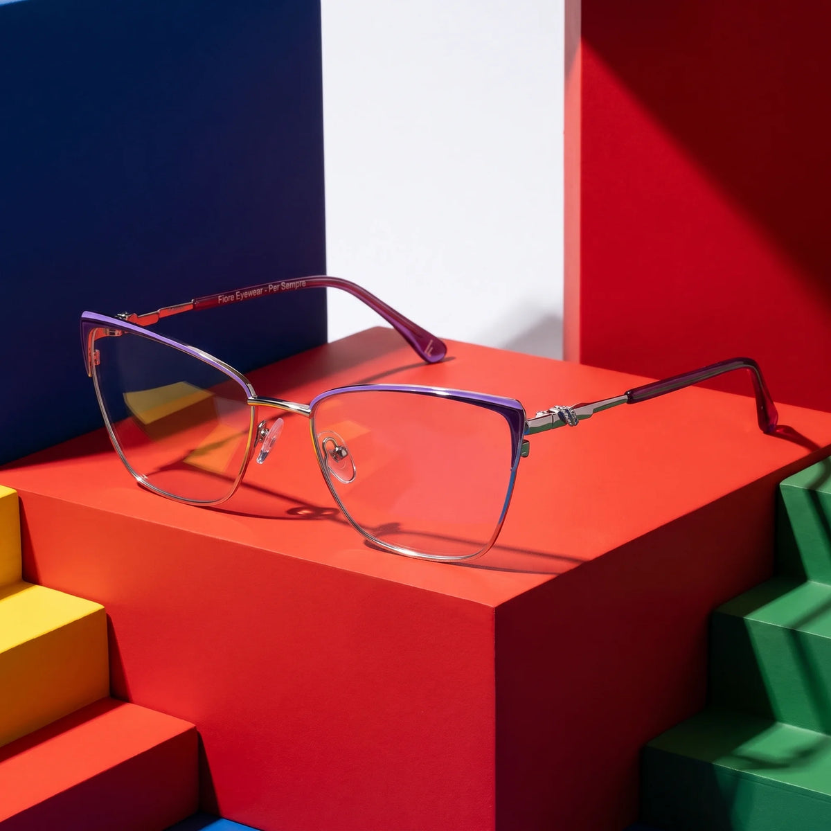 Fiore 3839 eyeglasses in purple silver – on bold primary color-block steps