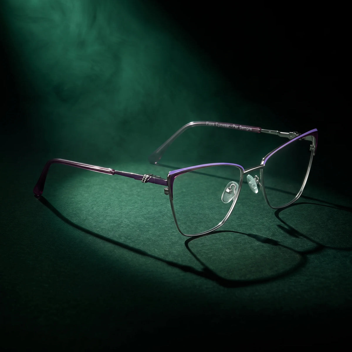 Fiore 3839 eyeglasses in purple silver – under a theatrical beam of light