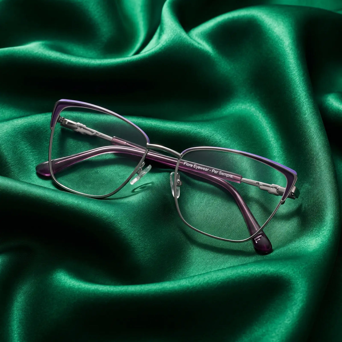 Fiore 3839 eyeglasses in purple silver – nested in flowing emerald silk