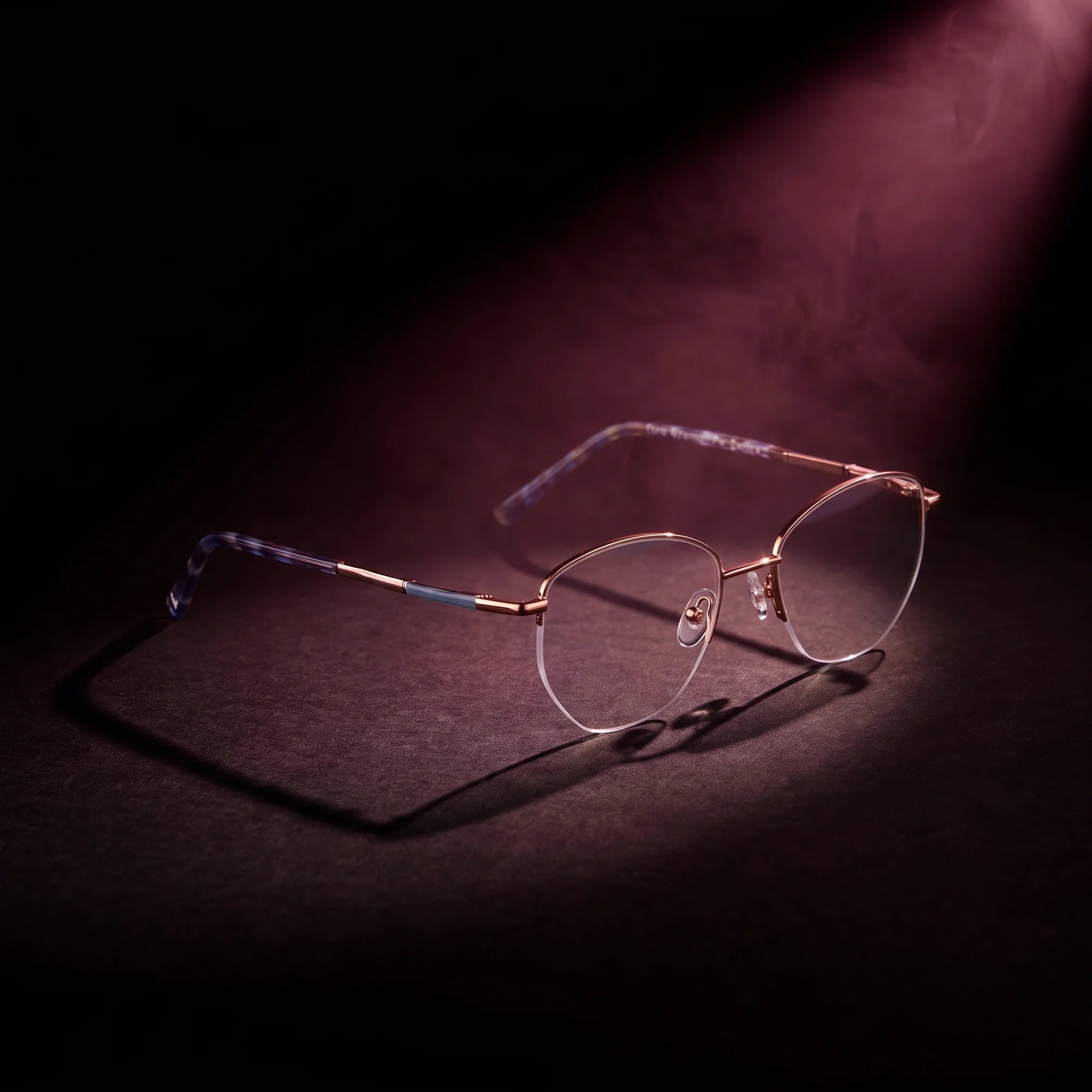 Fiore 3921 eyeglasses in grey brown – under a theatrical beam of light