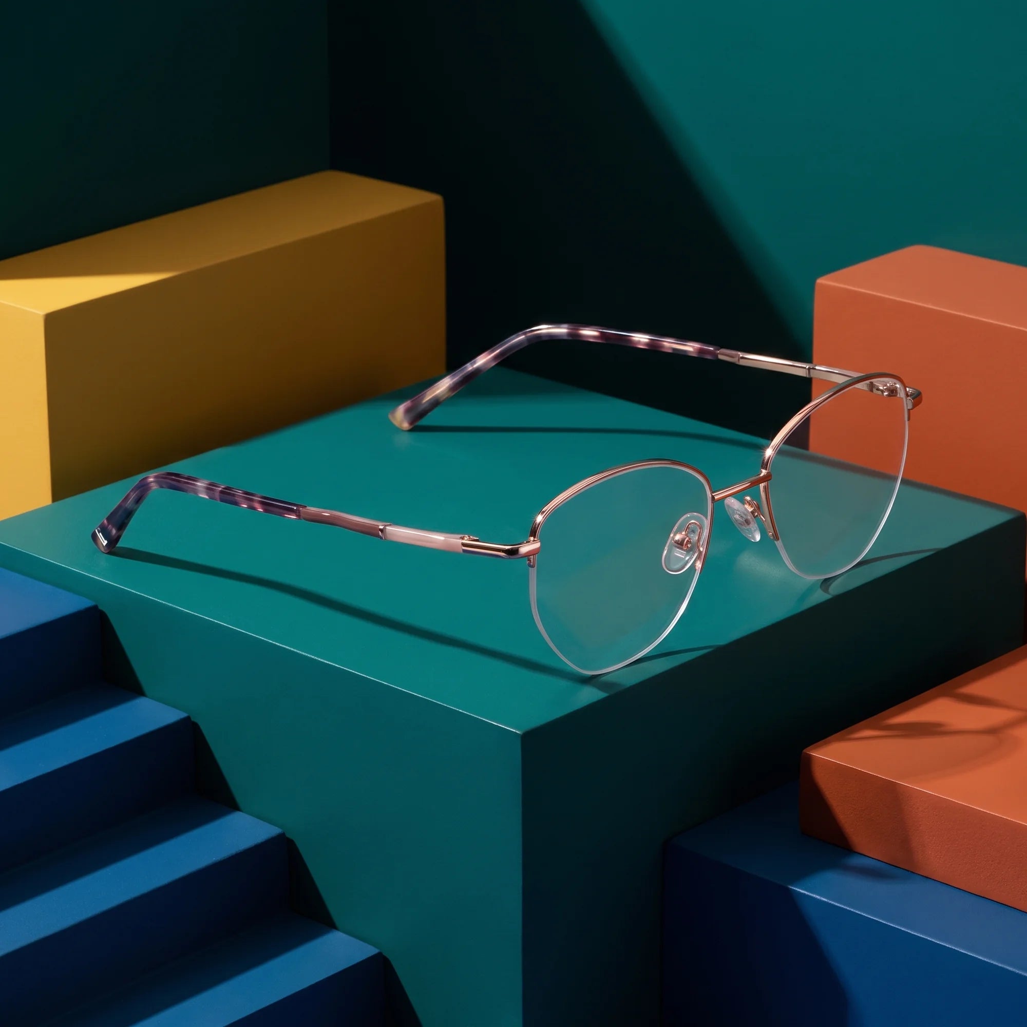 Fiore 3921 eyeglasses in brown gold – on bold primary color-block steps