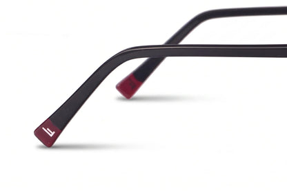 Fiore 3971 geometric sunglasses, black steel frame, black polarized lens, temple logo detail · ReFramed
