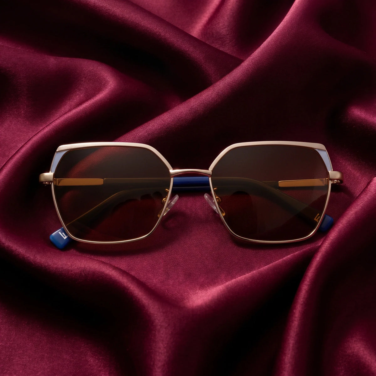 Fiore 3971 geometric sunglasses, gold steel frame, editorial still (angle 2) · ReFramed