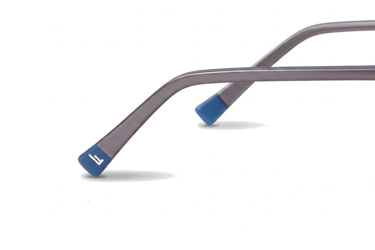 Fiore 3971 geometric sunglasses, gold steel frame, brown polarized lens, temple logo detail · ReFramed
