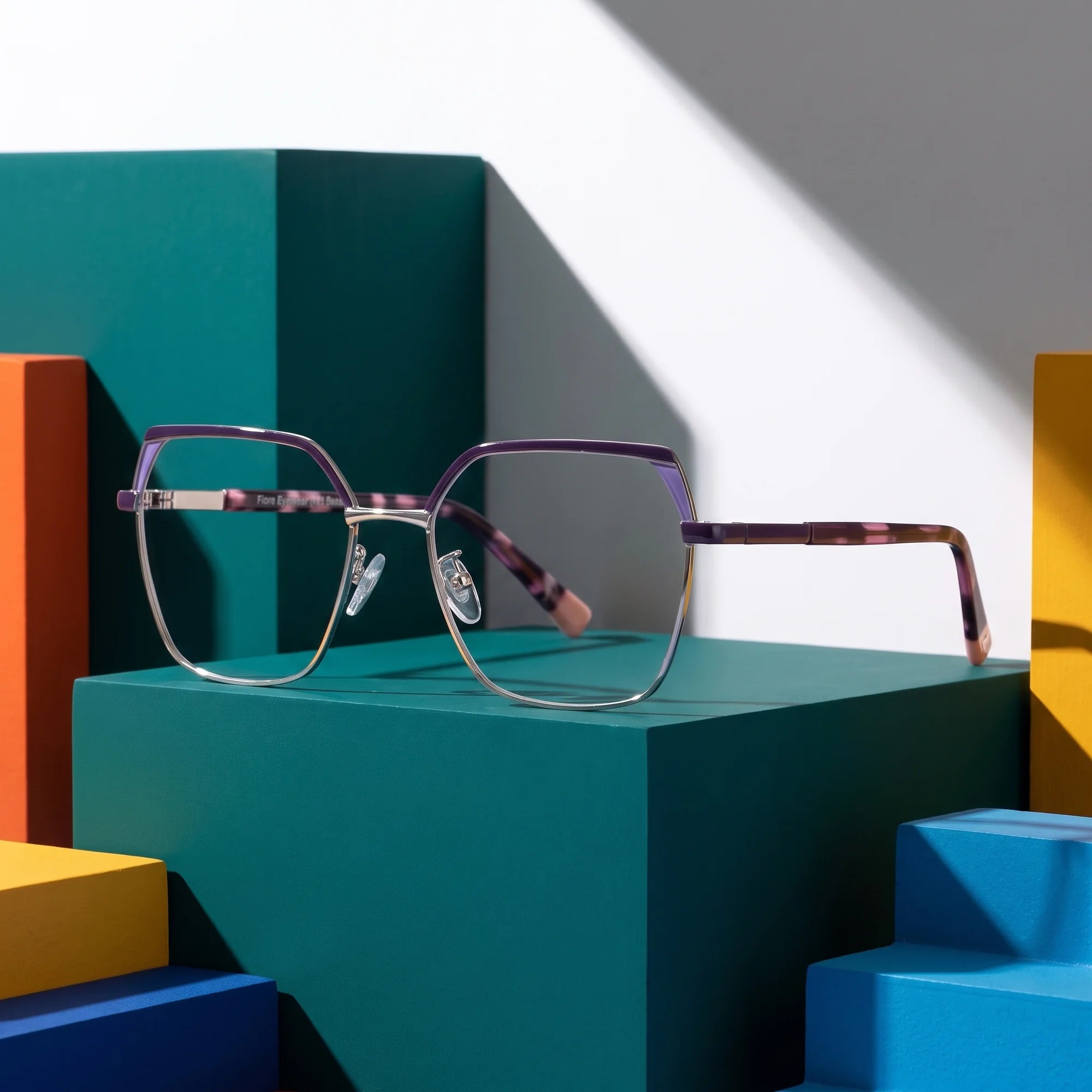 Fiore 3971 eyeglasses in purple silver – on bold primary color-block steps